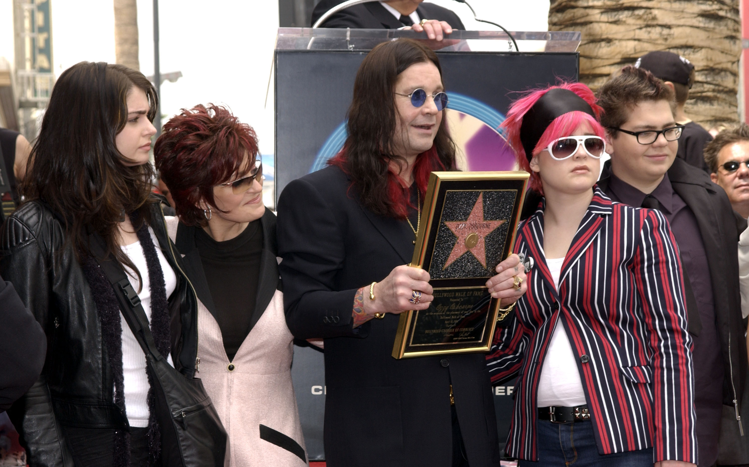 Aimee, Sharon, Ozzy, Kelly, and Jack Osbourne attend Ozzy's Hollywood Walk of Fame ceremony, where he was honored with his own star, on 12 April 2002. | Source: Getty Images