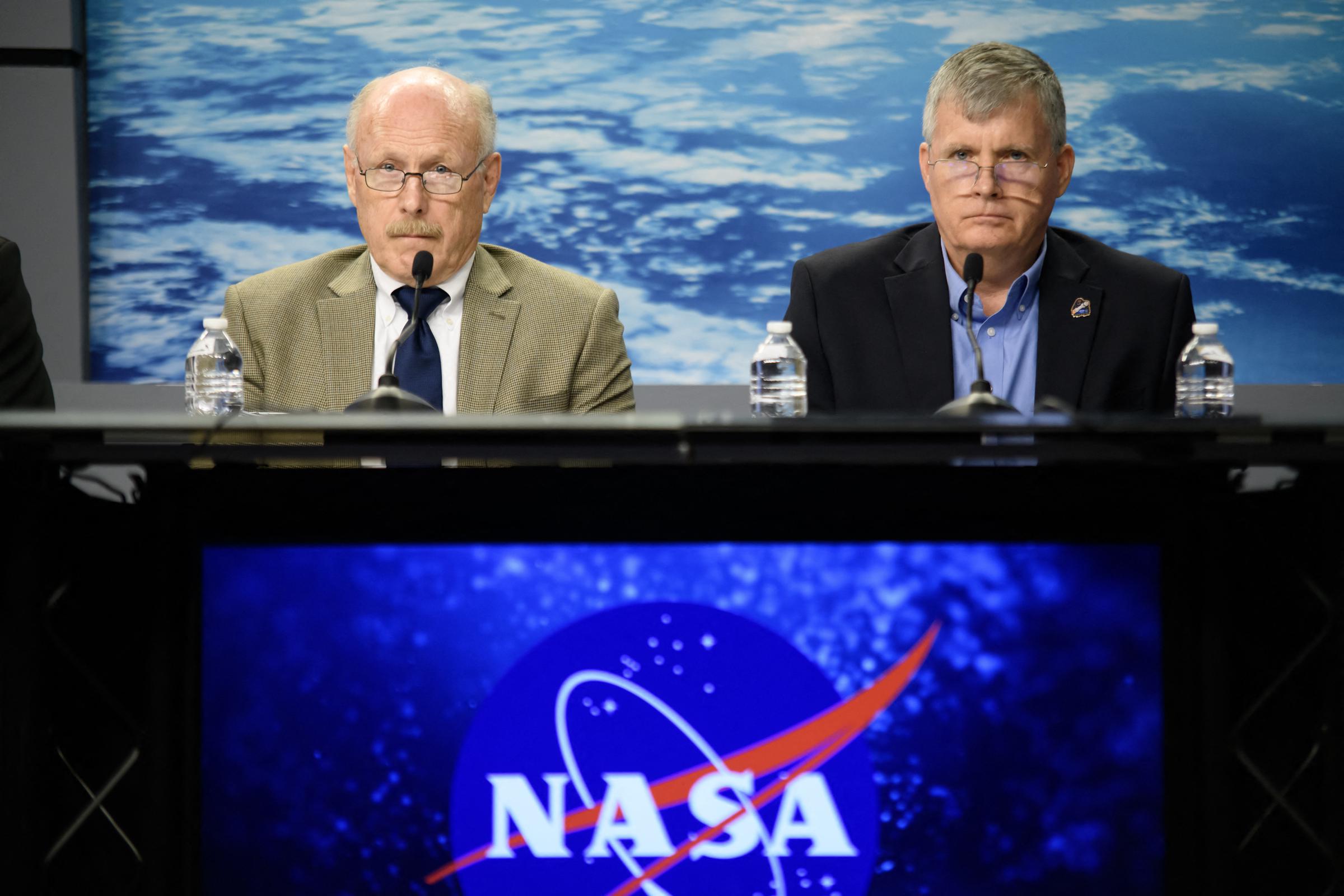 NASA agency officials listen to questions during a news conference to discuss plans to return two astronauts who remained stranded at the International Space Station, on August 24, 2024 | Source: Getty Images