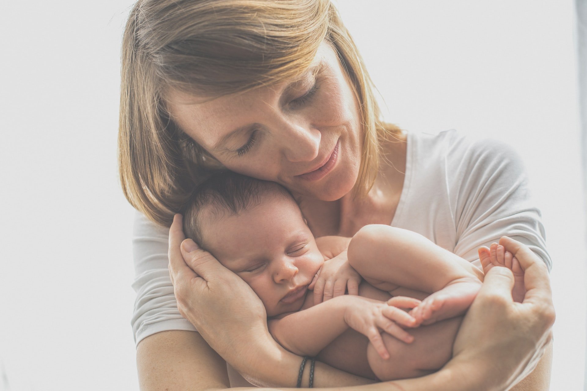 Mother-in-law holding her grandchild | Source: Unsplash