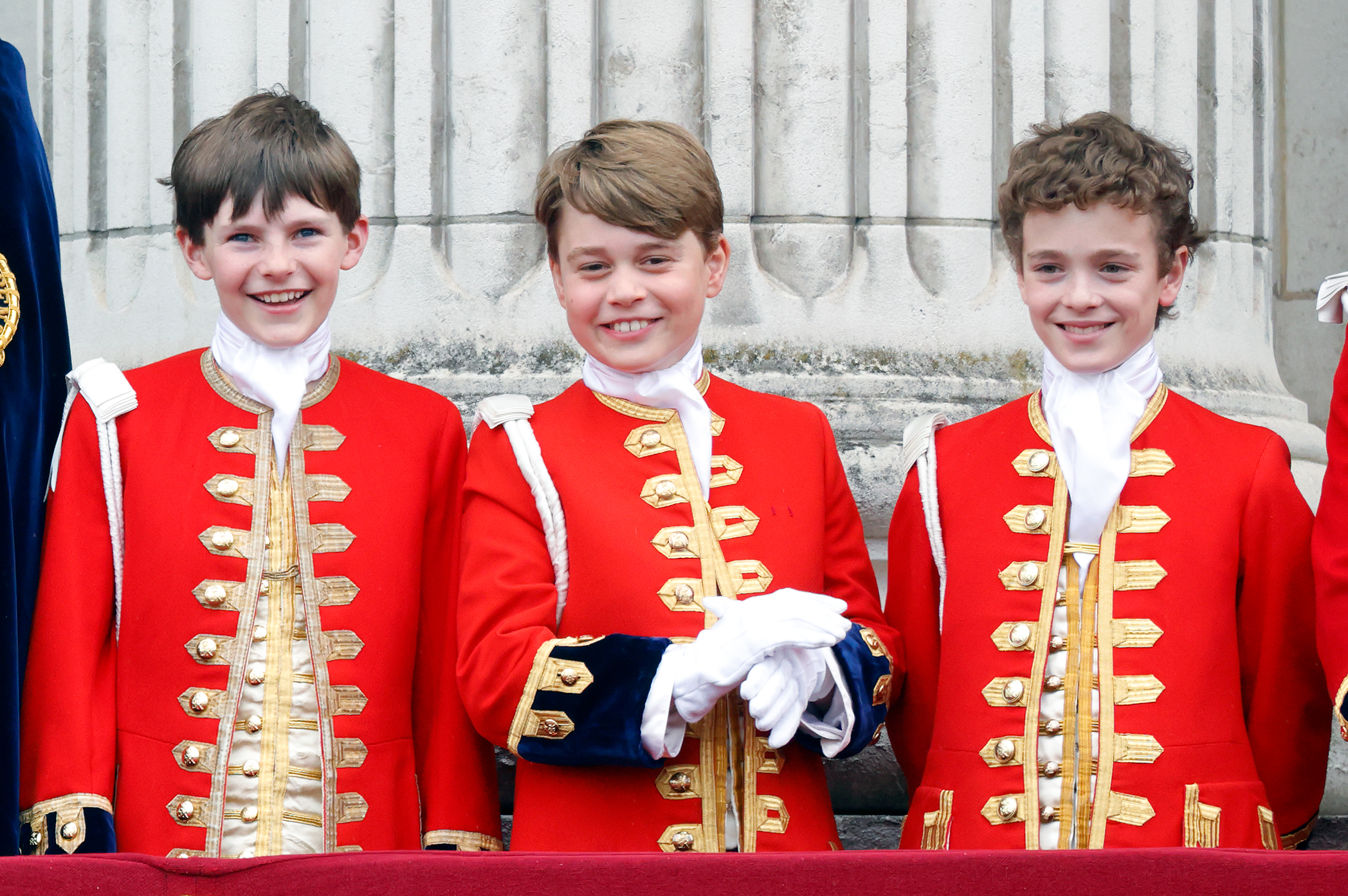 Pages of Honour Ralph Tollemache, Prince George of Wales and Lord Oliver Cholmondeley at Buckingham Palace during the Coronation of King Charles III  in London in 2023 | Source: Getty Images