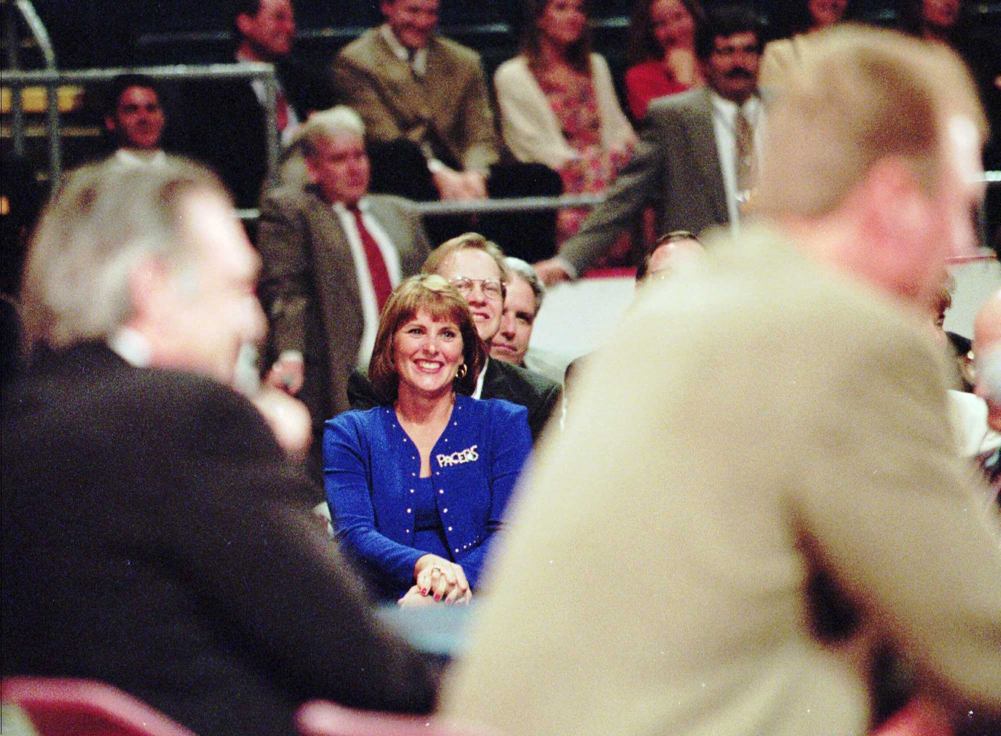 Dinah (Mattingly) Bird photographed as she watches during his press conference at Market Square Arena | Source: Getty Images