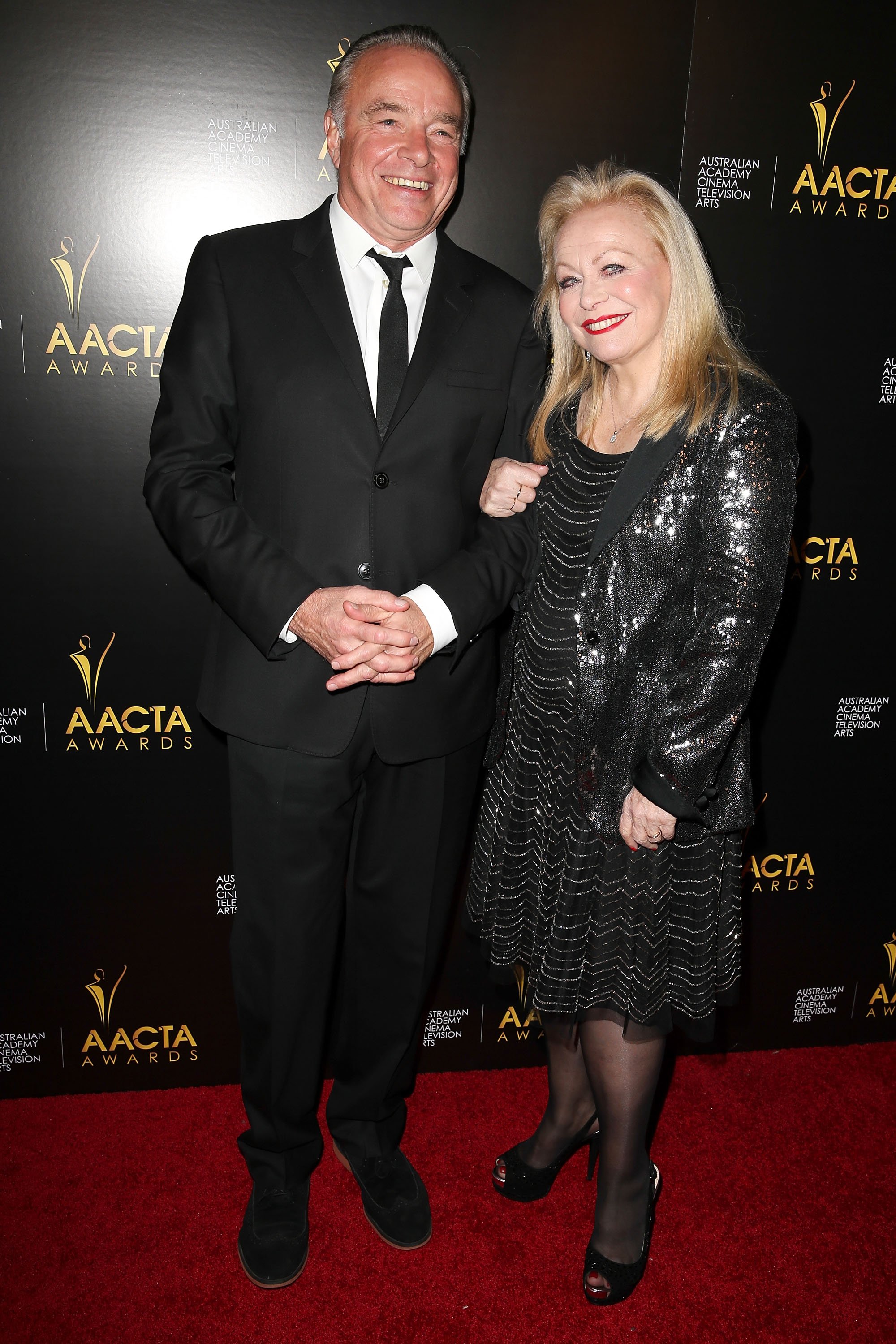 Jacki Weaver and Sean Taylor pose on the red carpet at the 3rd Annual Australian Academy International Awards (AACTA) at Sunset Marquis Hotel & Villas on January 10, 2014, in West Hollywood | Source: Getty Images