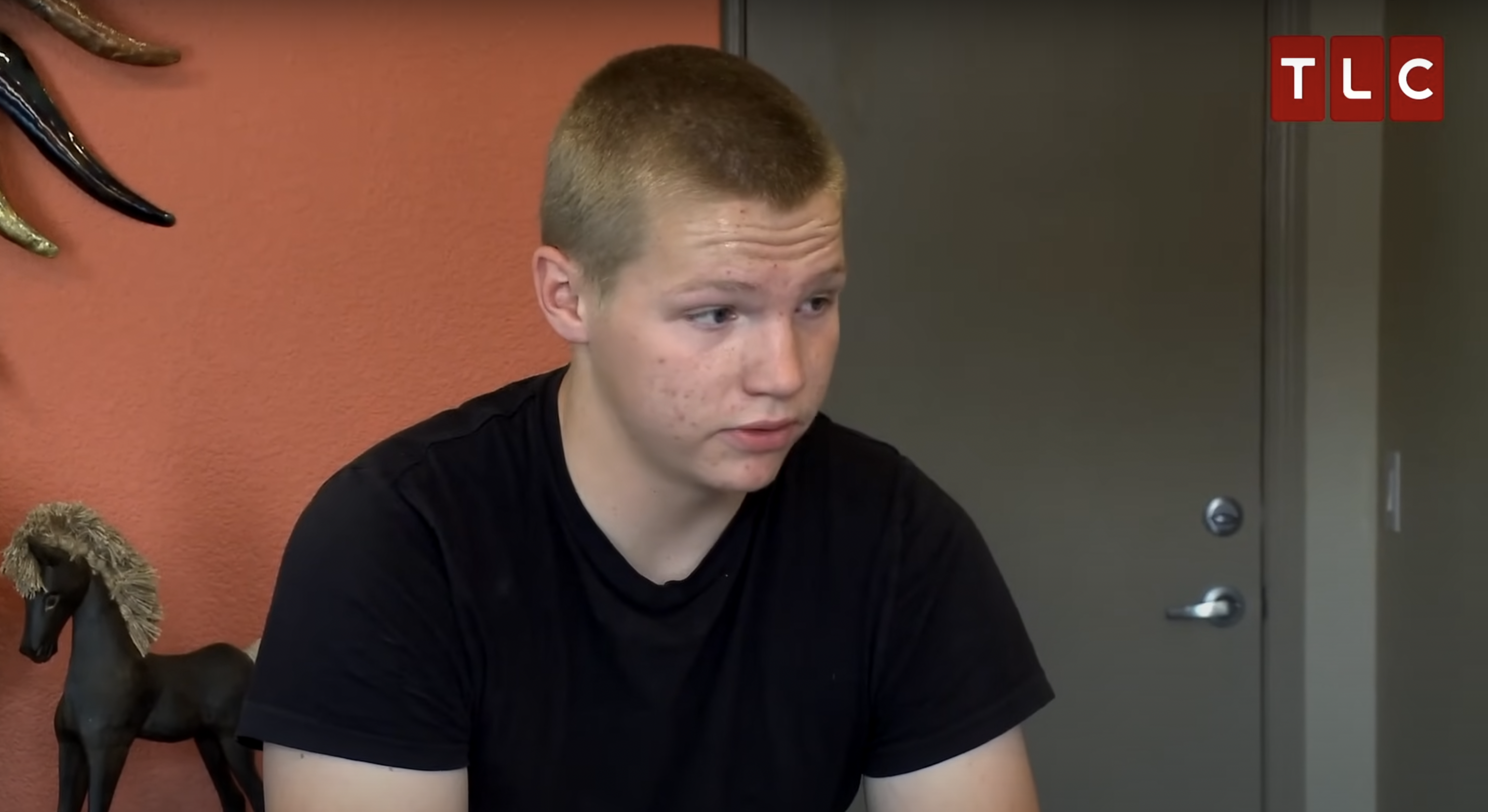 Garrison Brown in a clip from an episode of "Sister Wives" when he tells his parents about his interest to join the National Guard, published on May 19, 2016  | Source: youtube/tlc