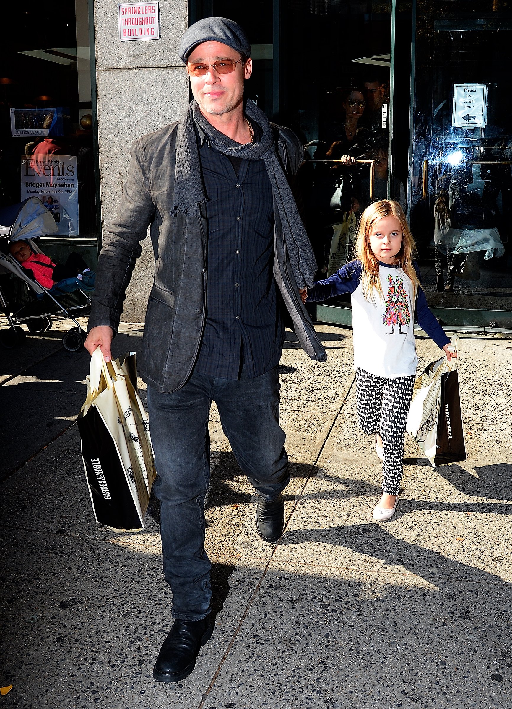 Actor Brad Pitt and Vivienne Jolie-Pitt at "Barnes & Noble in Midtownon November 3, 2015 in New York City. | Source: Getty Images