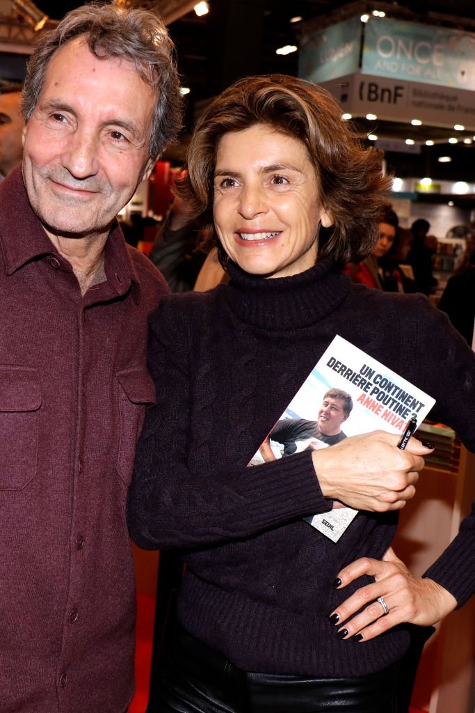 Jean-Jacques Bourdin et sa compagne Anne Nivat. | Photo : Getty Images.