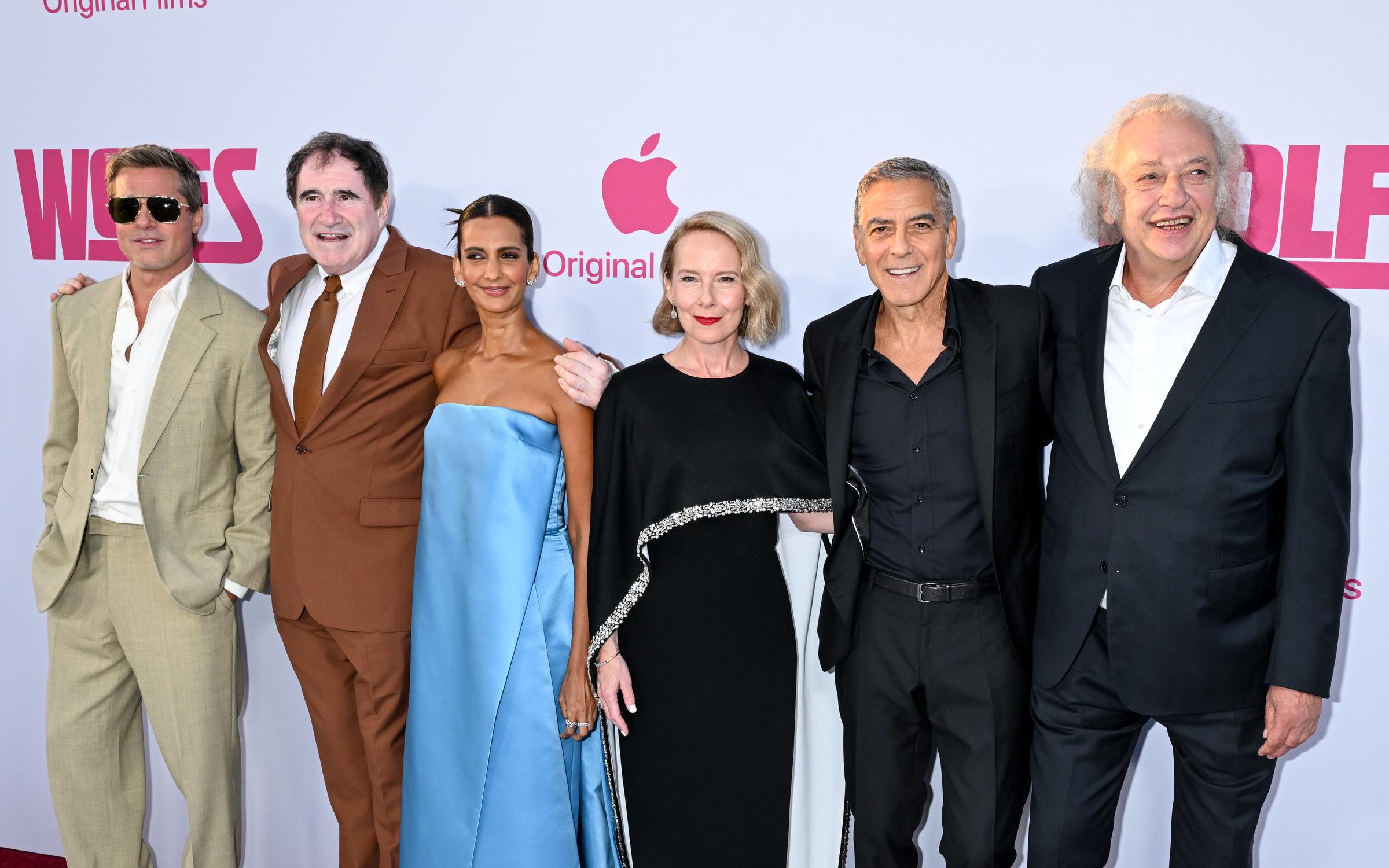 Brad Pitt, Richard Kind, Poorna Jagannathan, Amy Ryan, George Clooney and Zlatko Buri at the premiere of "Wolfs" held at TCL Chinese Theatre on September 18, 2024 in Los Angeles, California | Source: Getty Images