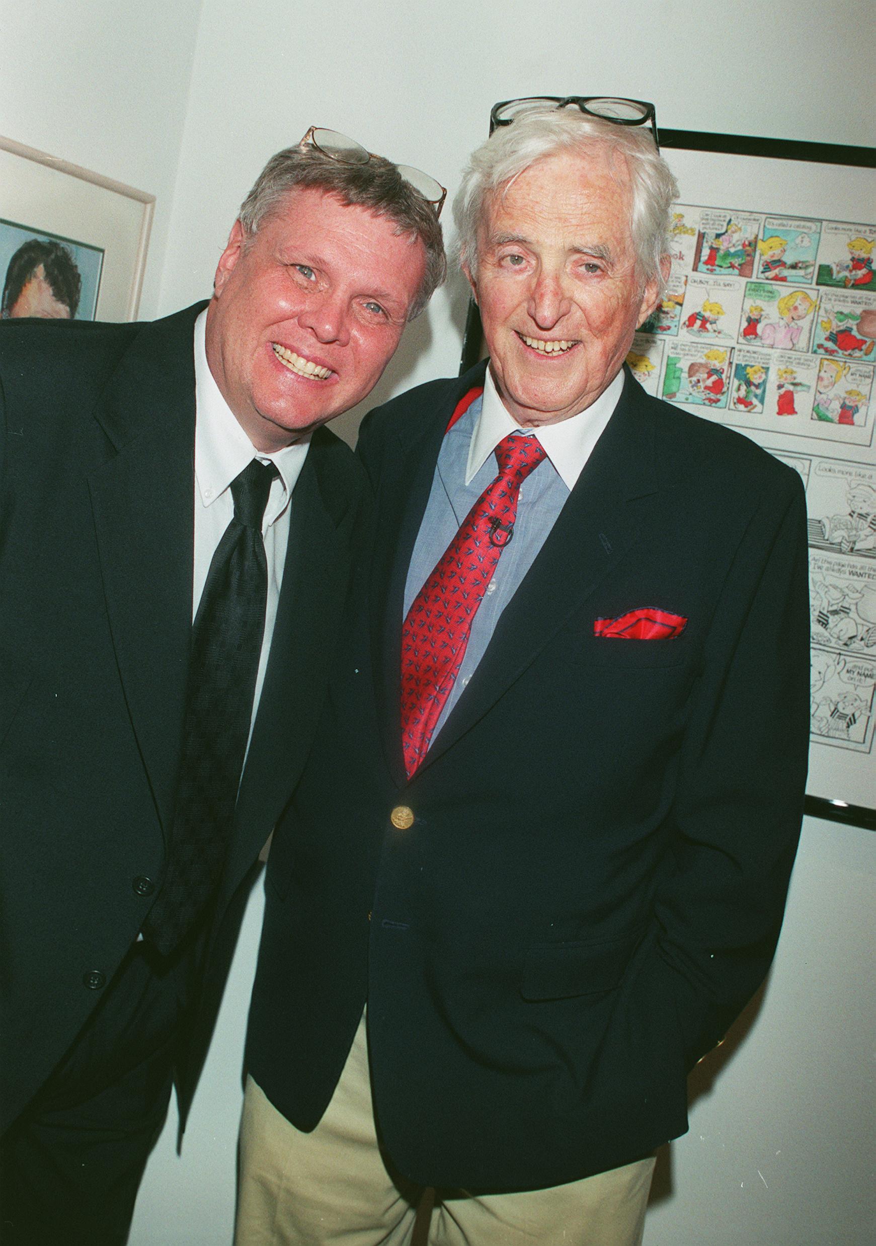 Jay North with cartoon creator, Hank Ketcham in Los Angeles, California on April 17, 1999 | Source: Getty Images