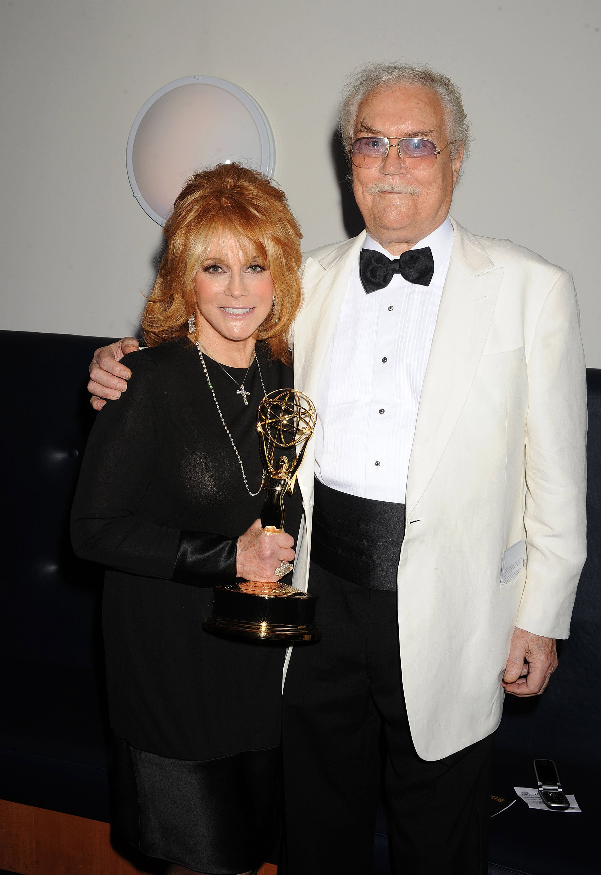 Ann-Margret and Roger Smith pose in the press room at the 2010 Creative Arts Emmy Awards at Nokia Theatre L.A. Live on August 21, 2010 in Los Angeles, California. / Source: Getty Images