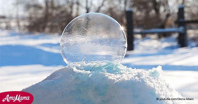 Woman blows a bubble onto a snow pile and then an amazing transformation takes place