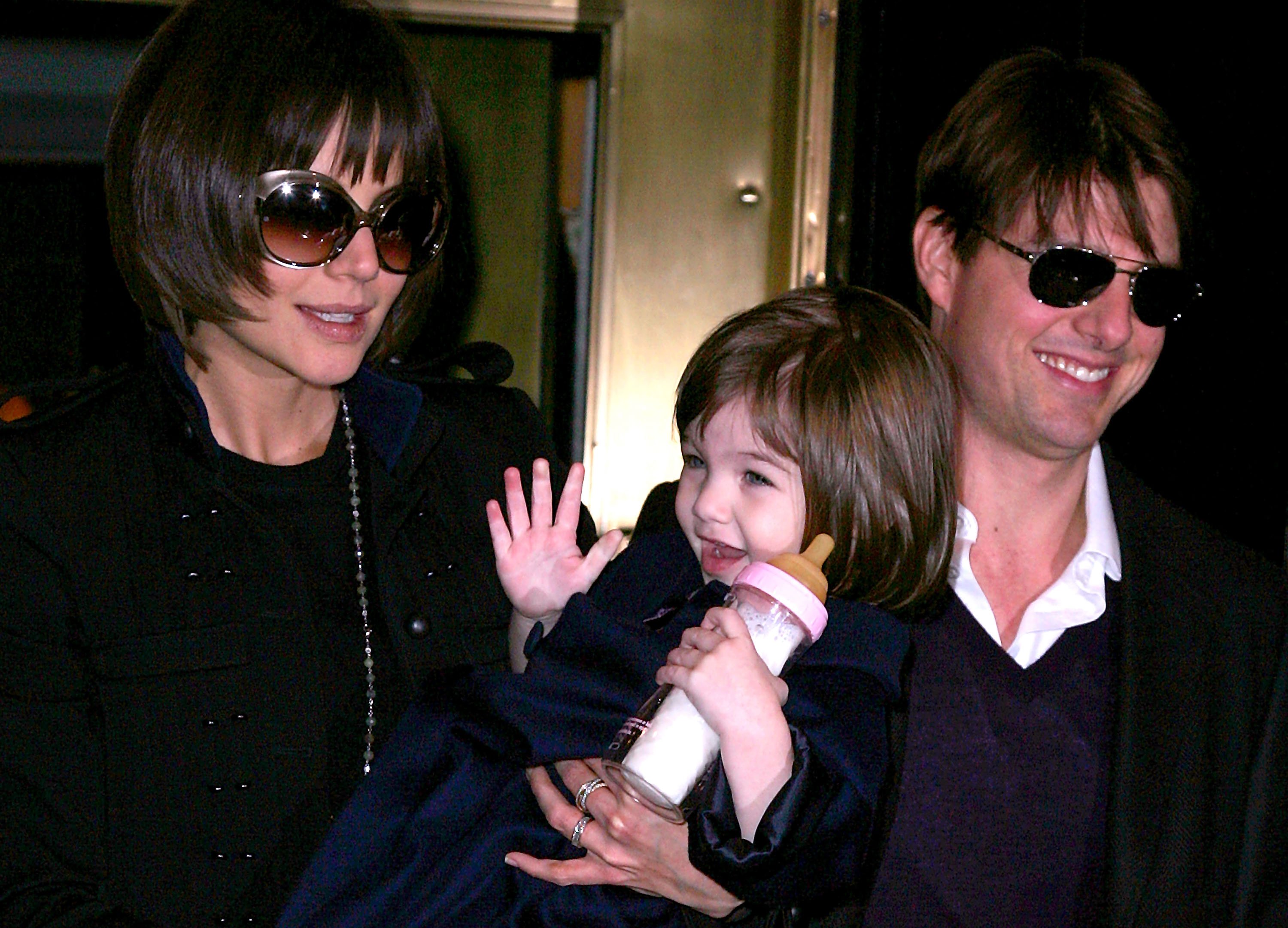 Katie Holmes and Tom Cruise seen with daughter Suri in New York City in 2008. | Source: Getty Images