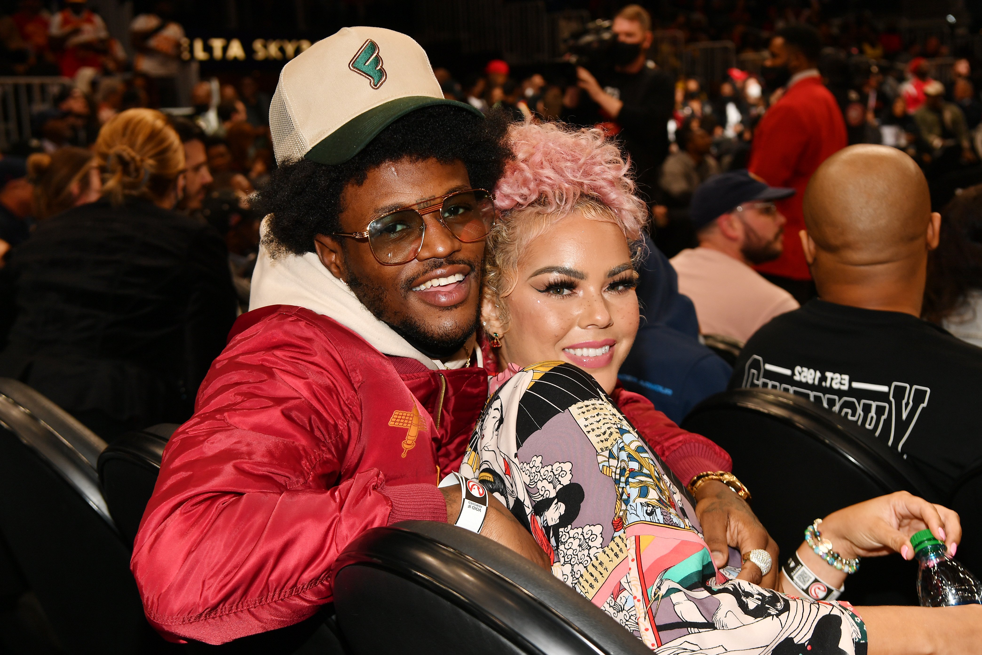 DC Young Fly and Jacky Oh at the State Farm Arena attending the game between the Denver Nuggets and the Atlanta Hawks on December 17, 2021, in Atlanta, Georgia. | Source: Getty Images