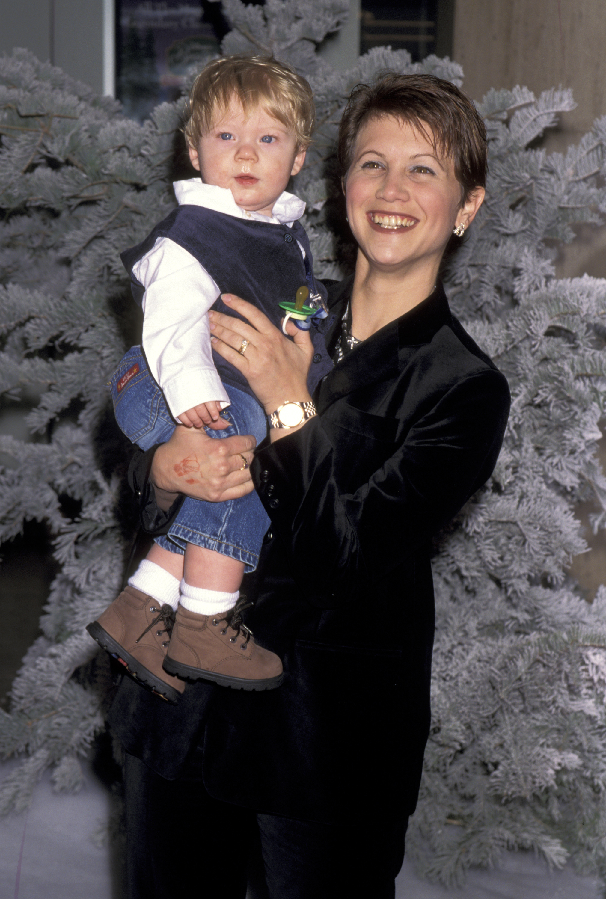 Tracey Gold and her son during the video release celebration for Disney's "Beauty & The Beast" on November 6, 1997, in Century City, California. | Source: Getty Images