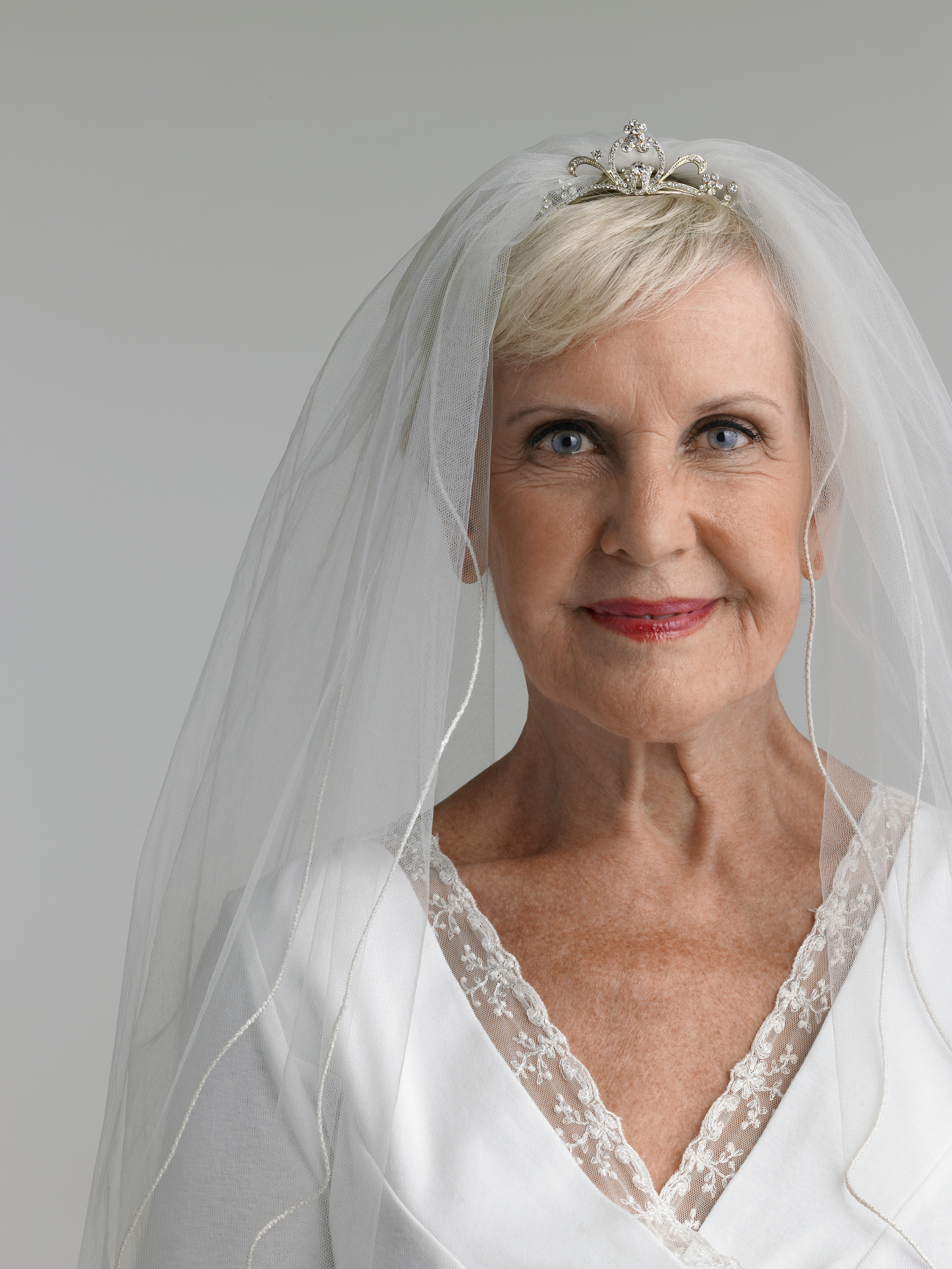 Senior woman wearing wedding dress, portrait | Source: Getty Images