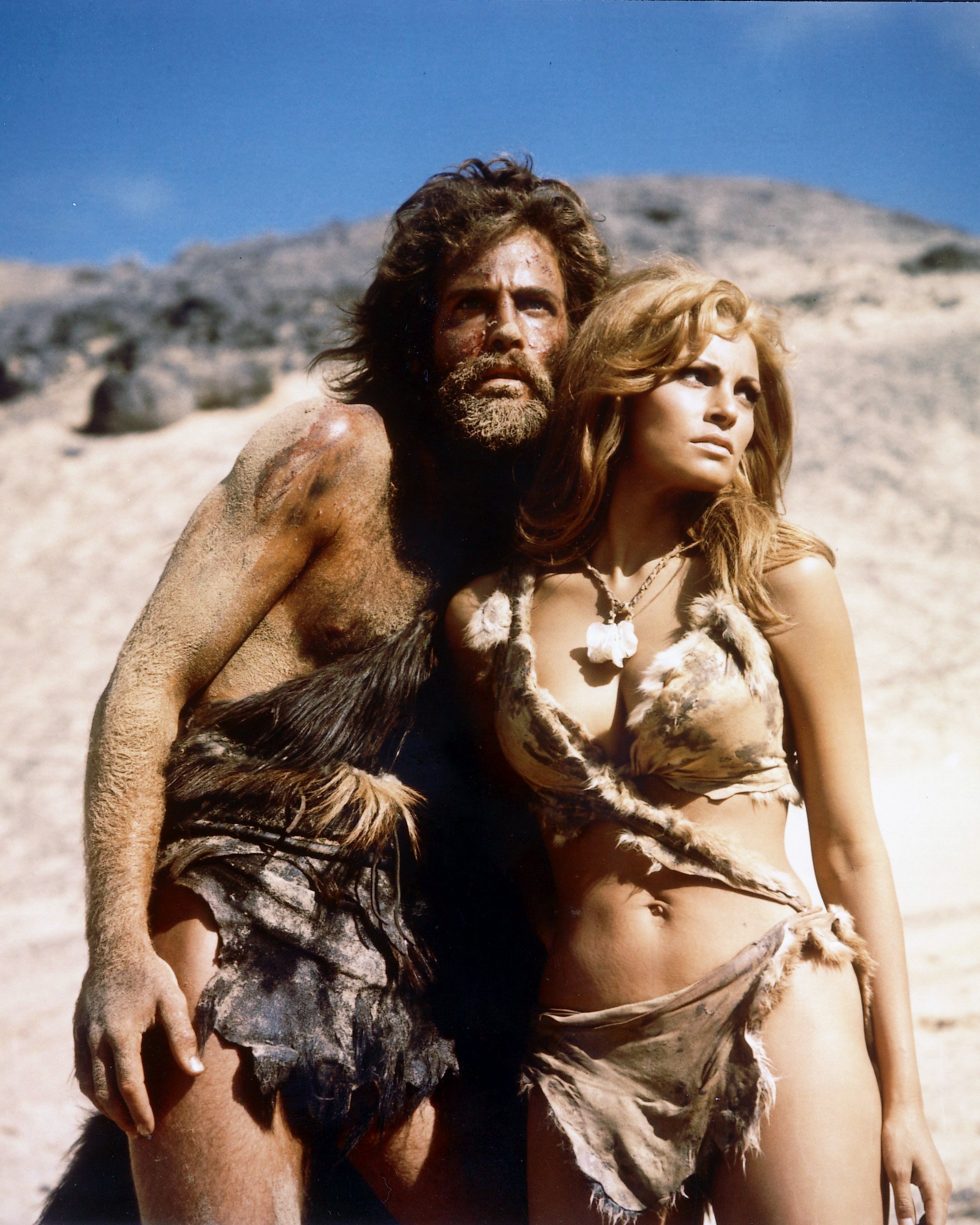 John Richardson, British actor, Raquel Welch, US actress, both wearing animal hides in a publicity portrait issued for the film, 'One Million Years BC', 1966 | Source: Getty Images 