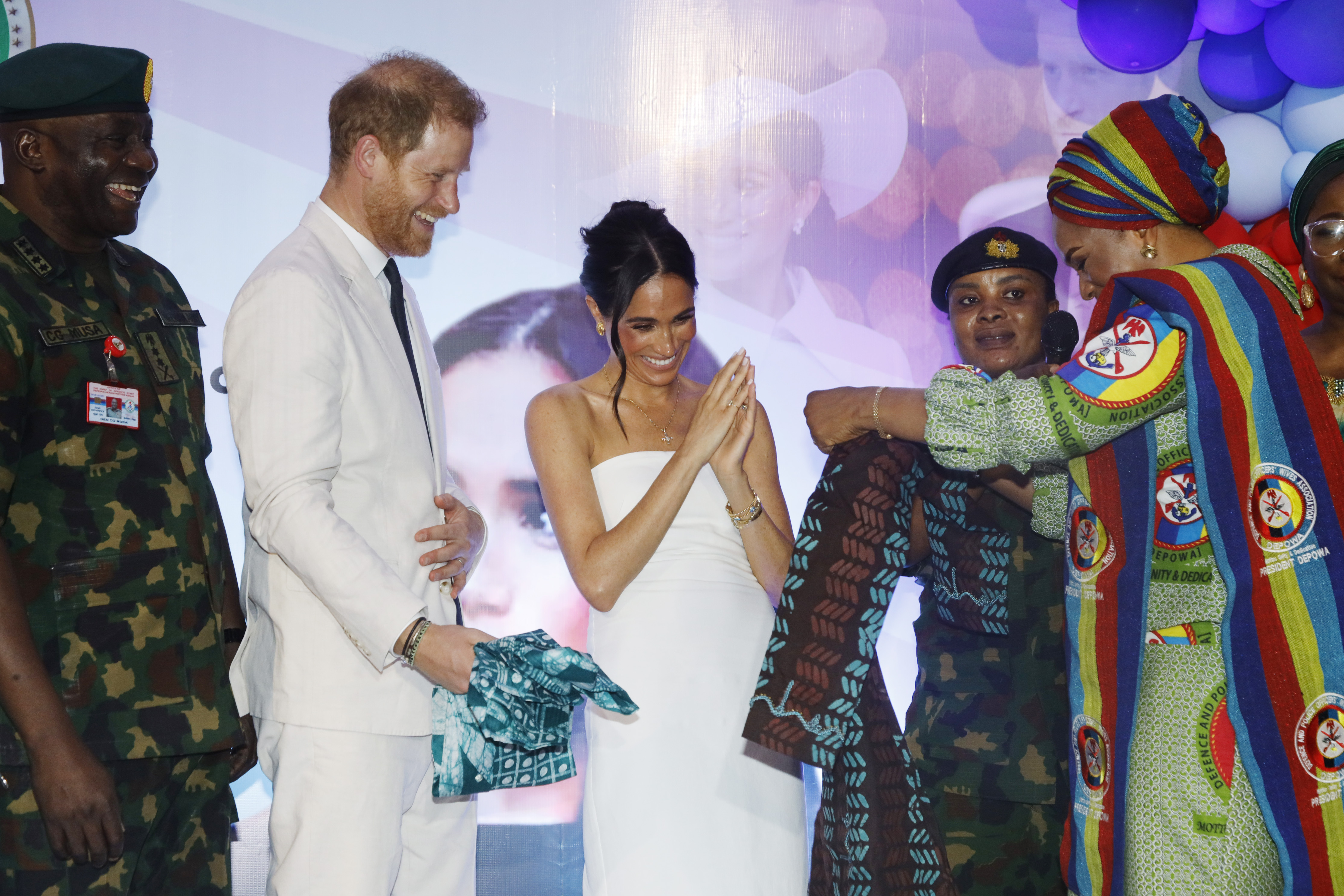 Meghan Markle and Prince Harry at a Sit Out at the Nigerian Defence Headquarters in Abuja on May 11, 2024 | Source: Getty Images