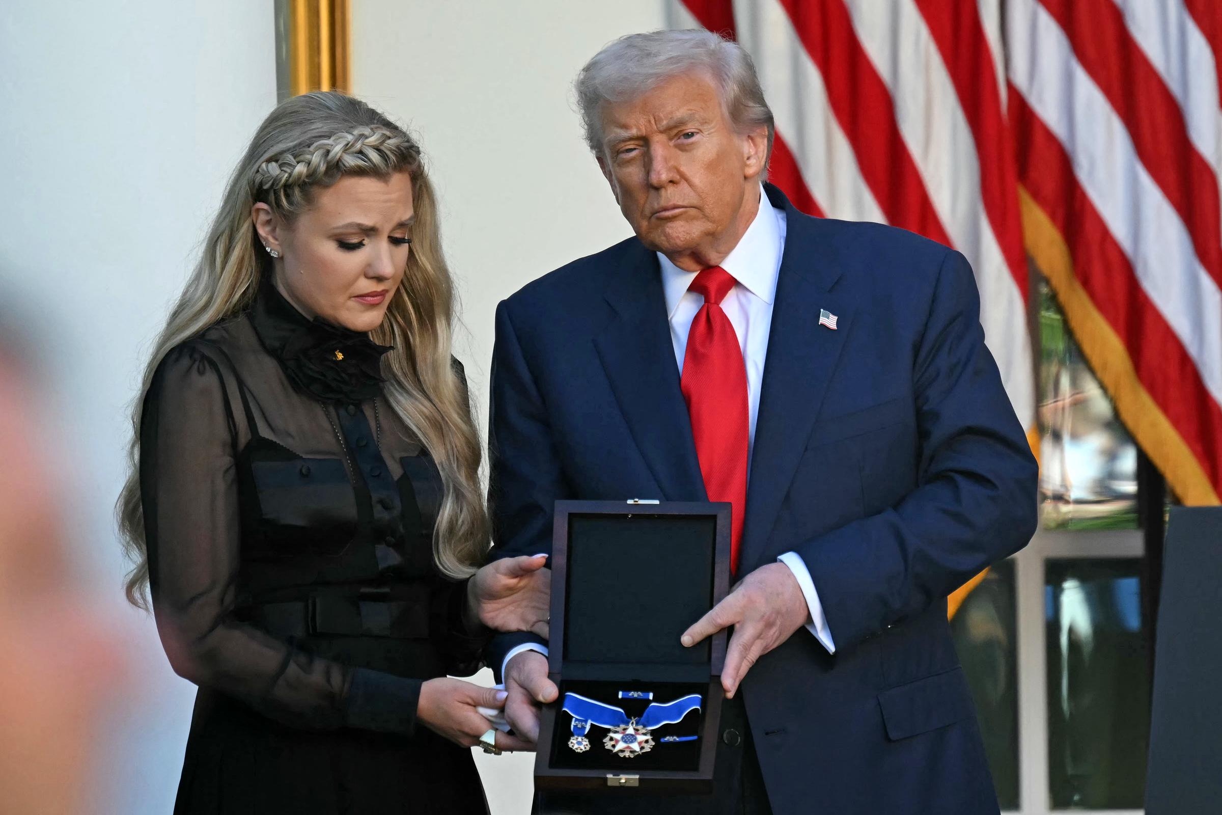 Donald Trump and Erika Kirk participate in a Medal of Freedom Ceremony for late US right-wing activist Charlie Kirk in the Rose Garden of the White House in Washington, DC, on October 14, 2025 | Source: Getty Images