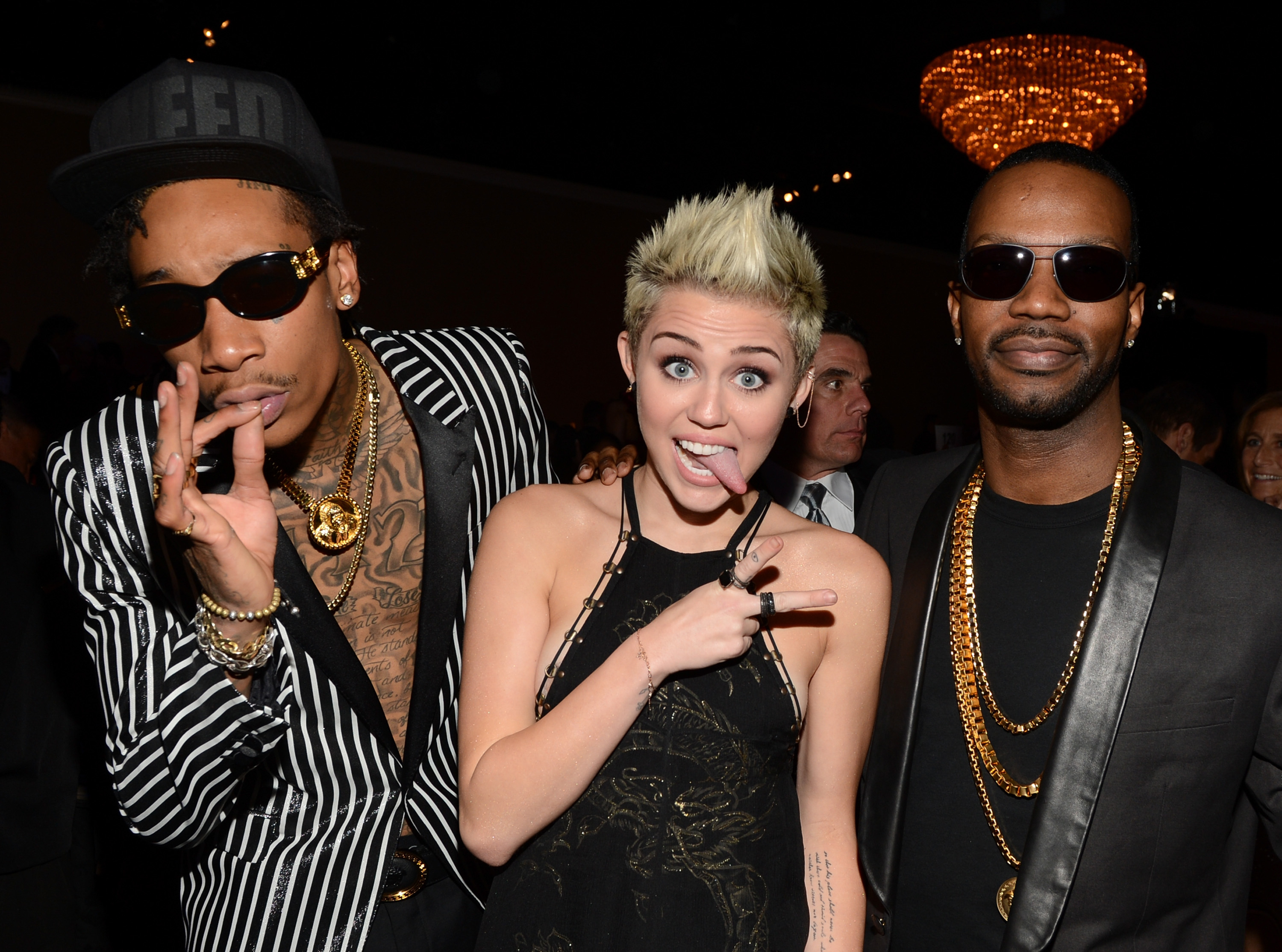 Wiz Khalifa, Miley Cyrus, and Juicy J during the 55th Annual Grammy Awards Pre-Grammy Gala and Salute to Industry Icons honoring L.A. Reid on February 9, 2013, in Los Angeles, California. | Source: Getty Images