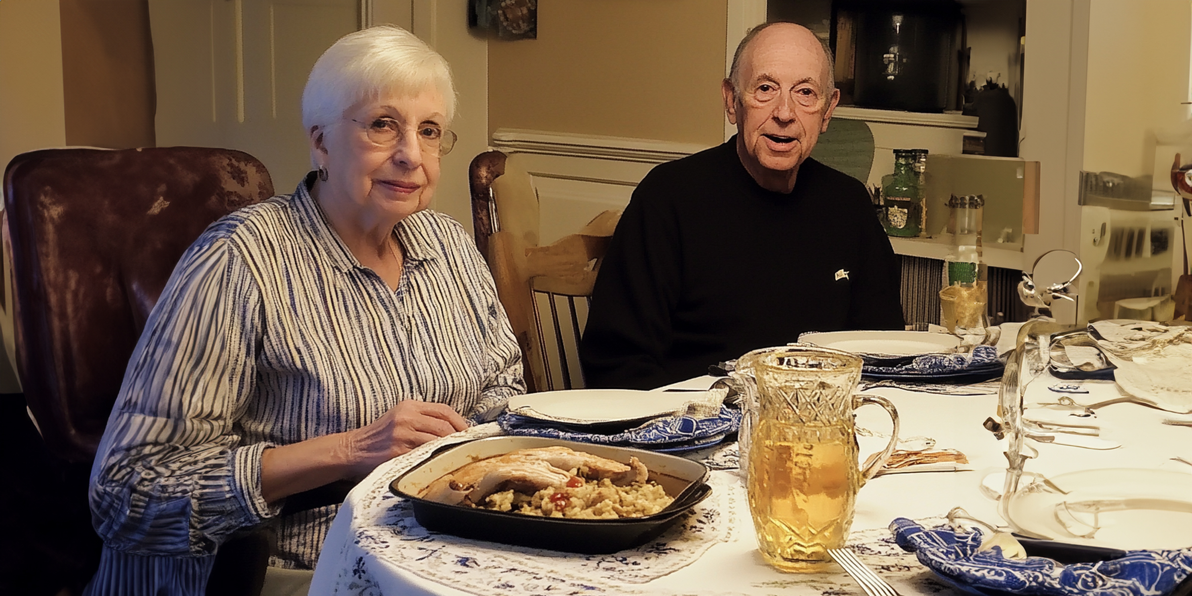 An elderly couple at dinner table | Source: Amomama