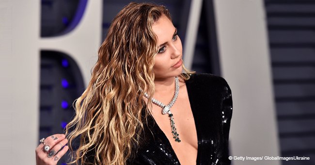 Miley Cyrus Goes Braless in a Plunging Dress with so Many Diamonds: ‘It’s Cold in Here’