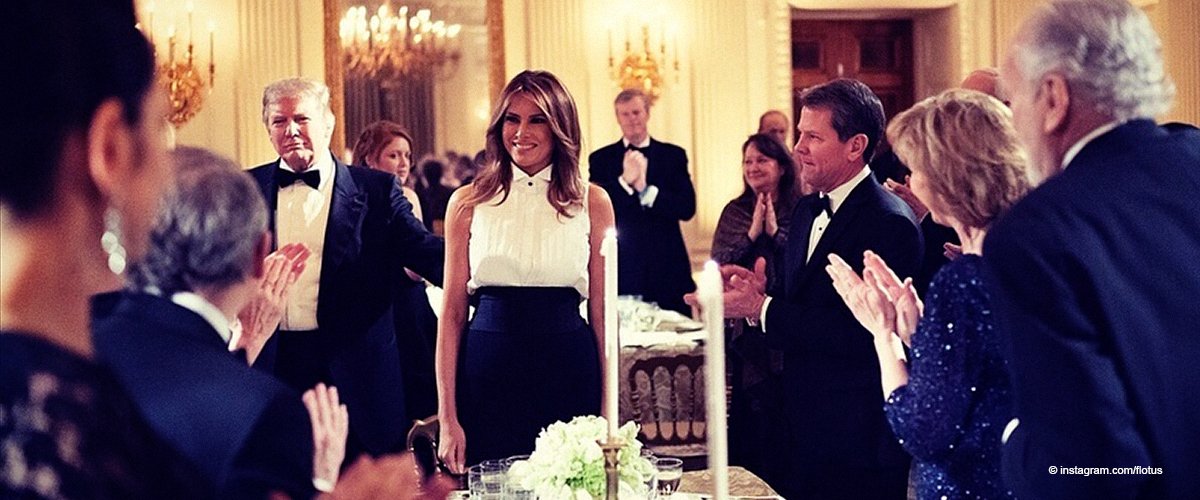 Melania Trump Draws Attention to Her Sleeveless White Top Matched with Flowing Black Pants