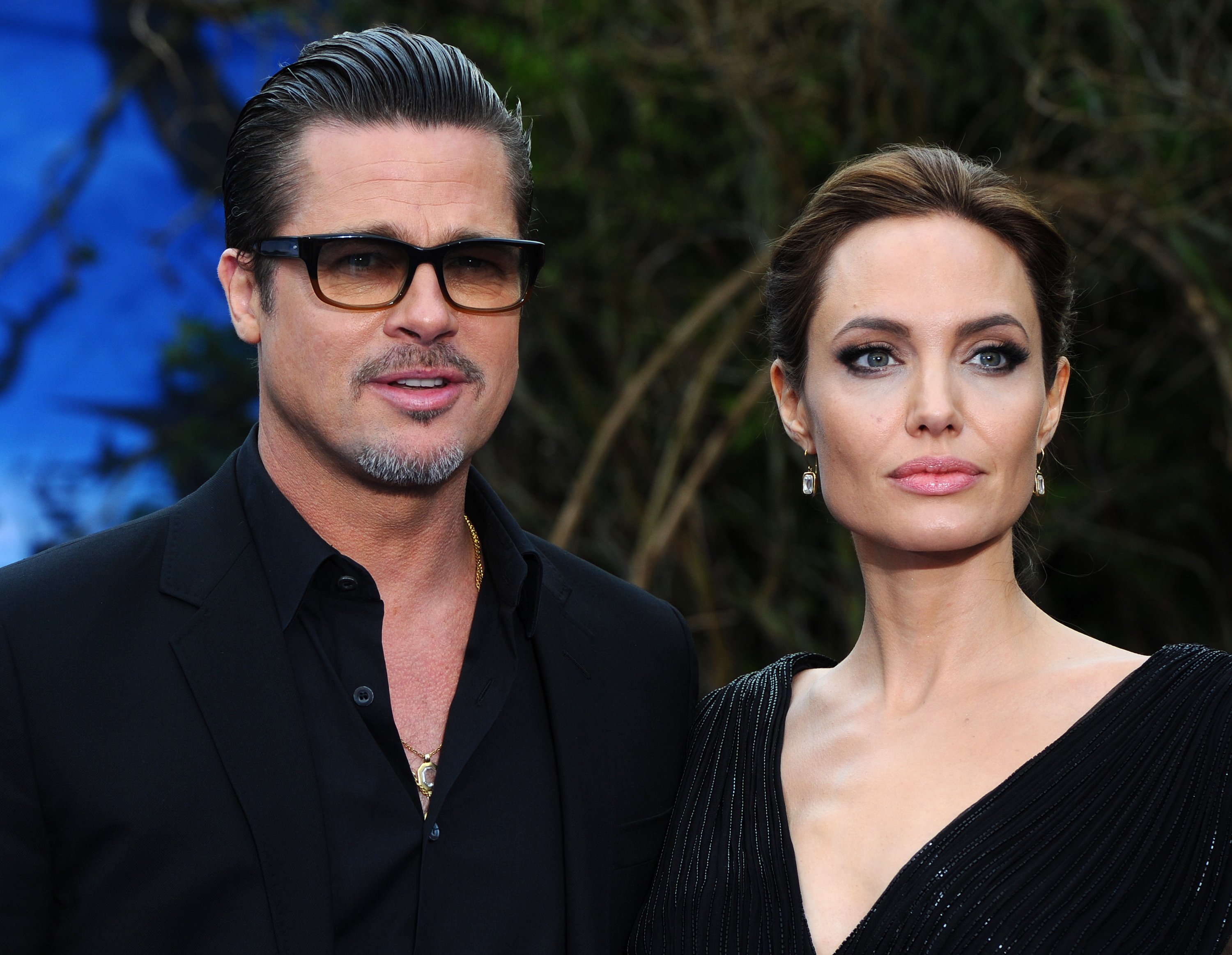 Brad Pitt and Angelina Jolie attend a private reception as costumes and props from Disney's "Maleficent" are exhibited in support of Great Ormond Street Hospital at Kensington Palace on May 8, 2014 in London, England | Source: Getty Images