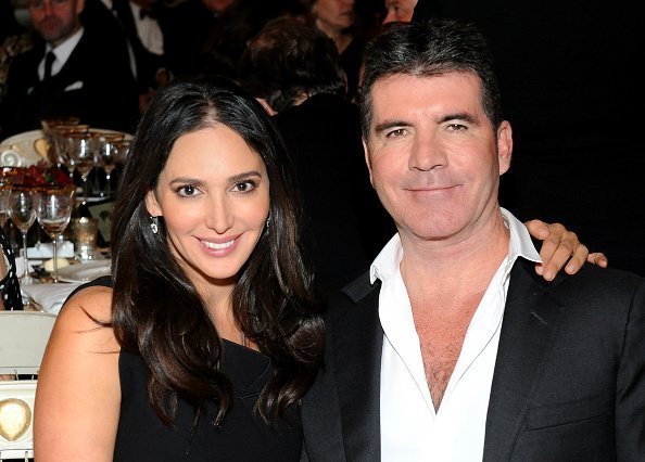 Simon Cowell and Lauren Silverman on February 3, 2015 in London, England | Source: Getty Images