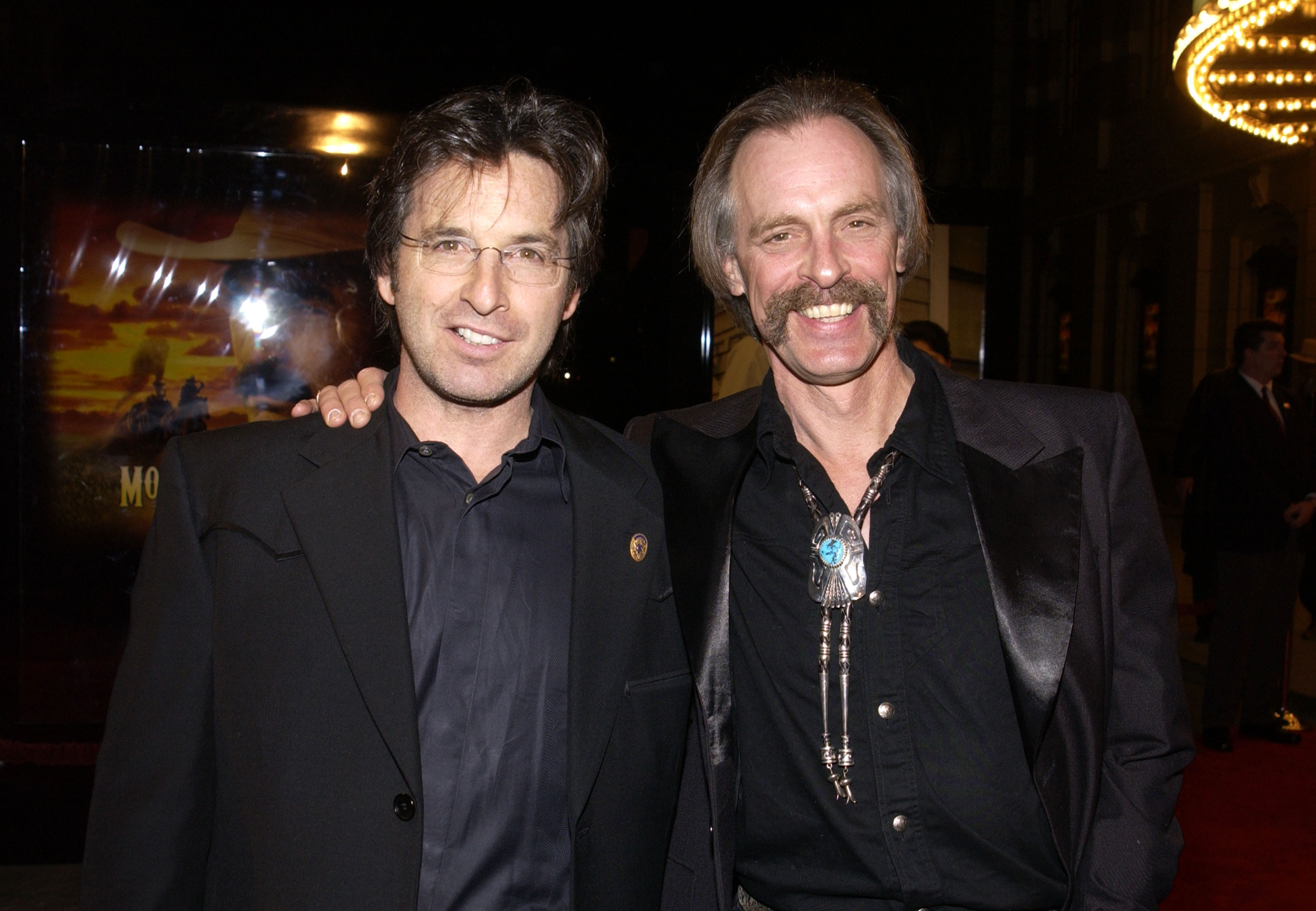 Robert Carradine and Keith Carradine during the TNT "Monte Walsh" Los Angeles premiere at Warner Bros. Studios on January 8, 2003, in Burbank, California | Source: Getty Images