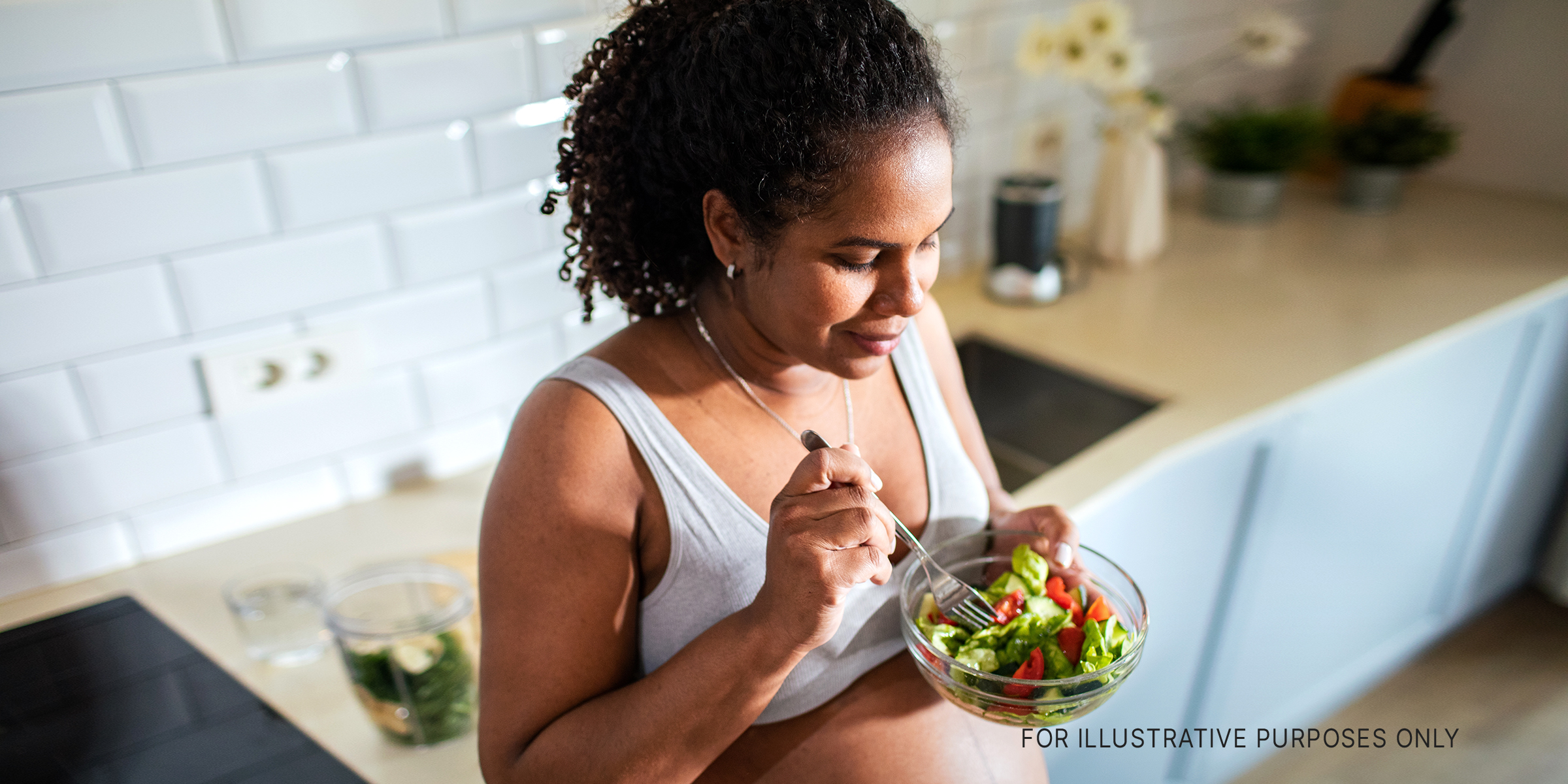 A woman eating | Source: Shutterstock