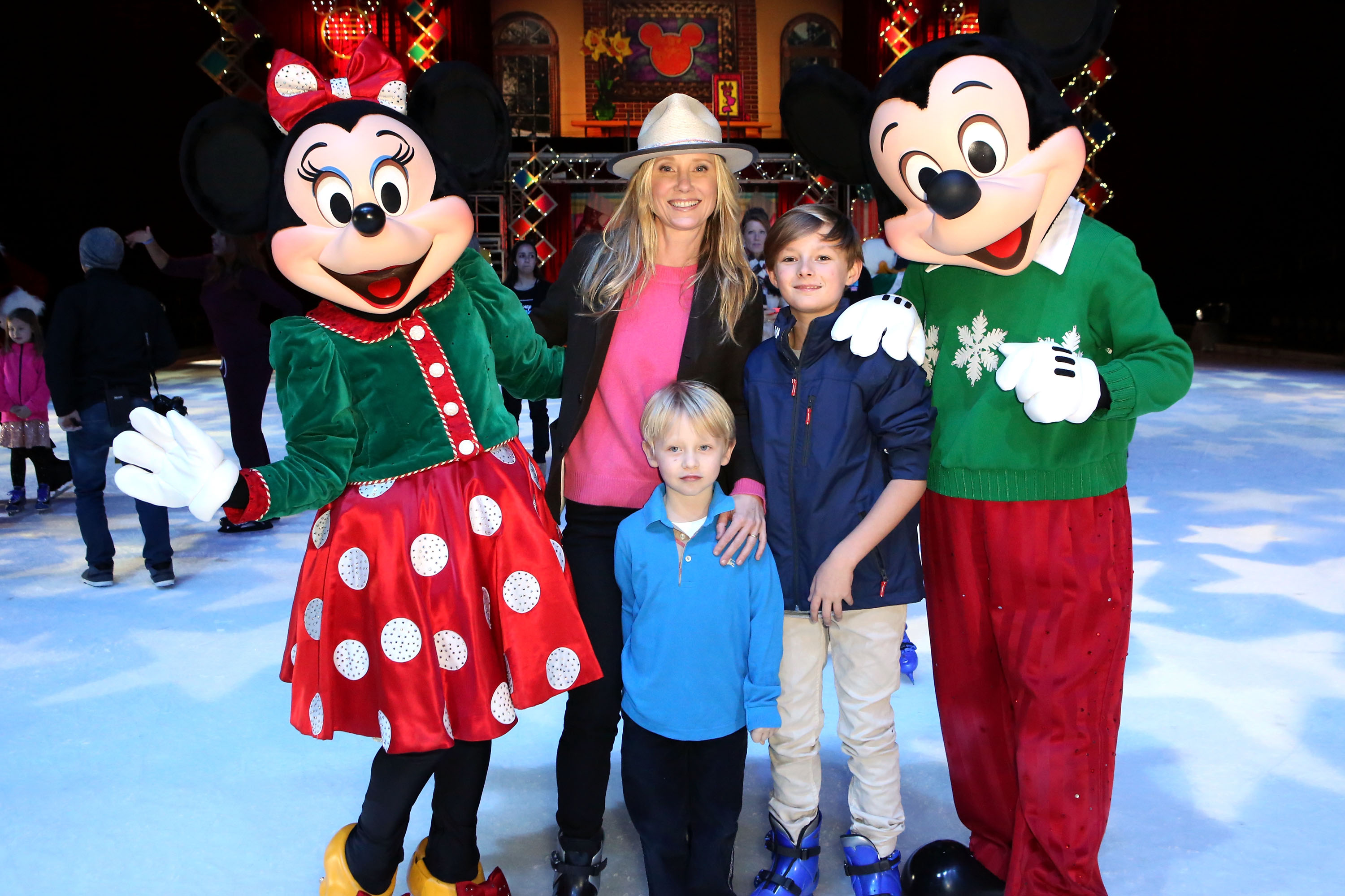 Anne Heche, son Atlas, and son Homer attend Disney On Ice Presents Let's Celebrate! Presented By Stonyfield YoKids Organic Yogurt Celebrity Premiere & Skating Party at Staples Center on December 11, 2014 in Los Angeles, California. | Source: Getty Images