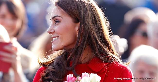 Kate Middleton Stuns the Crowd with Her Classy Red Coat during a Surprise Outing with William