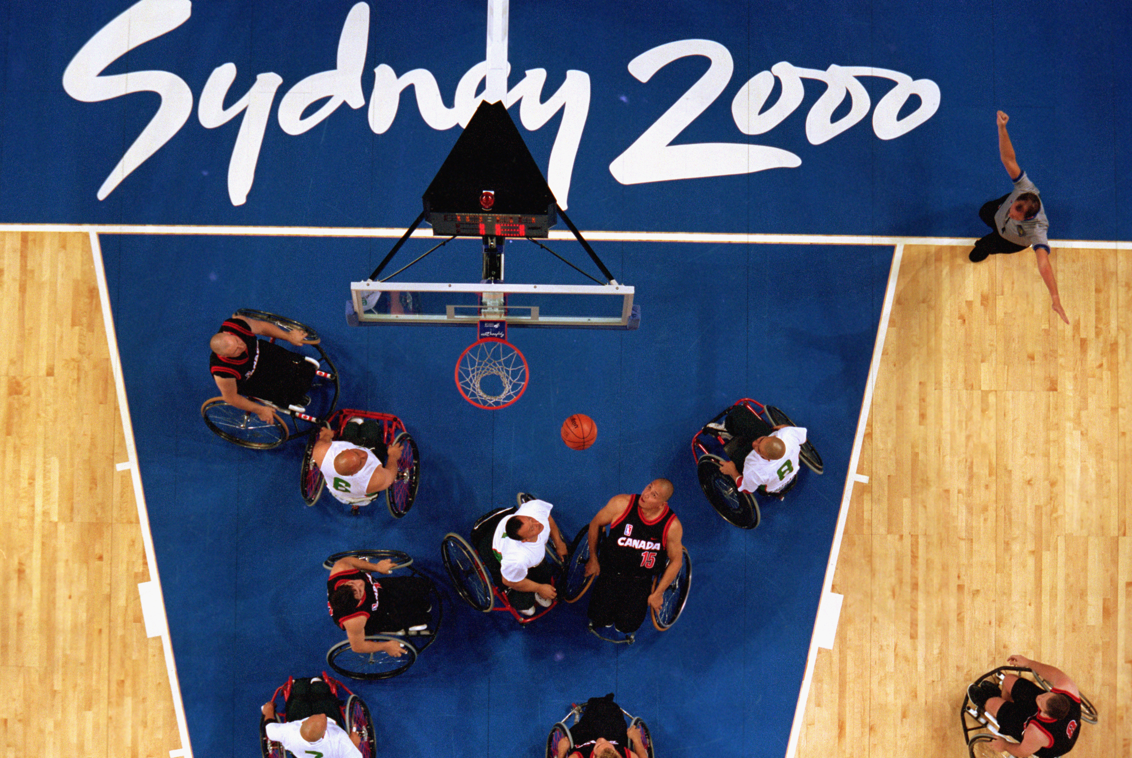 Richard Peter of Team Canada watches the ball in the Men's Wheelchair Basketball Prelims against Team Mexico during the Sydney 2000 Paralympic Games on October 19, 2000 at Sydney Superdomein Sydney, Australia | Source: Getty Images