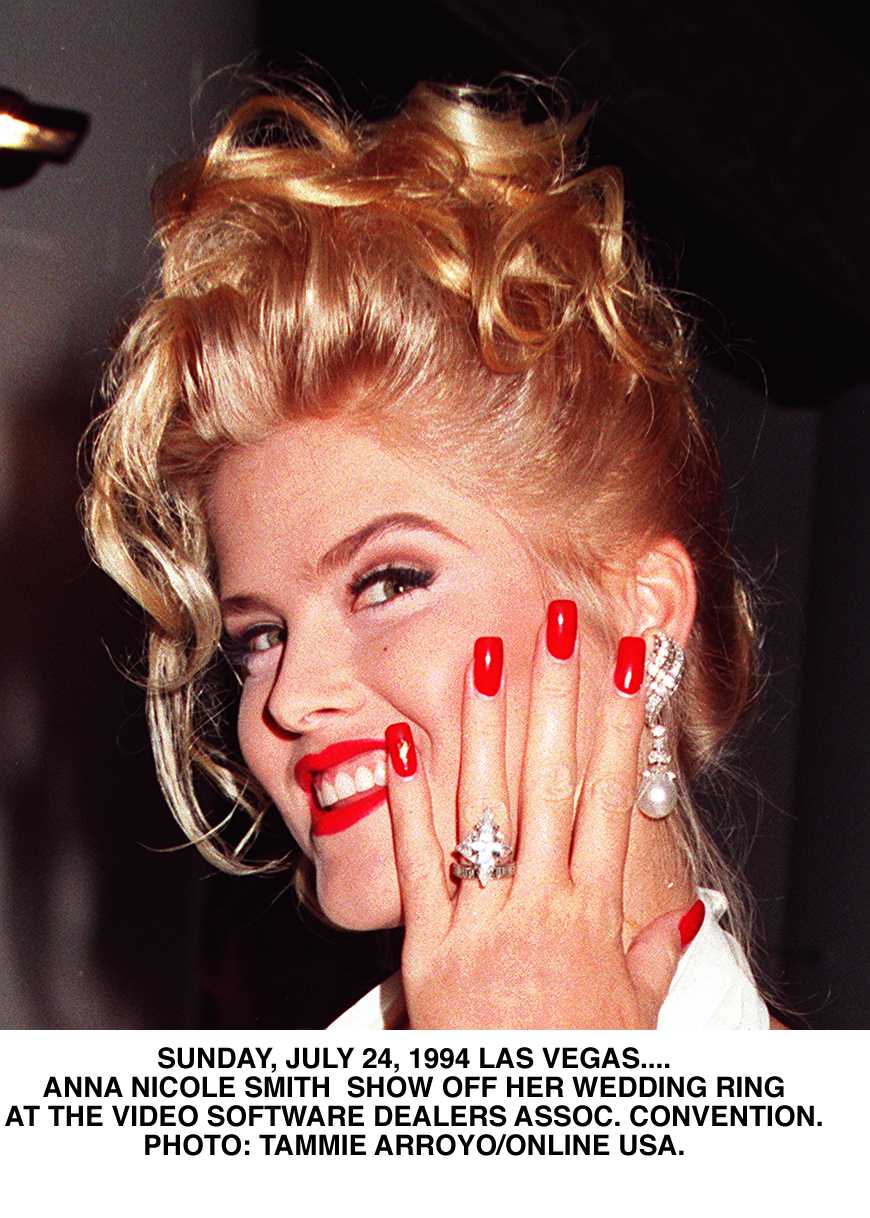 Anna Nicole Smith Shows Off Her New Wedding Ring Given To Her Husband J. Howard Marshall II on Sunday July 24 1994 in Las Vegas  | Source: Getty Images 