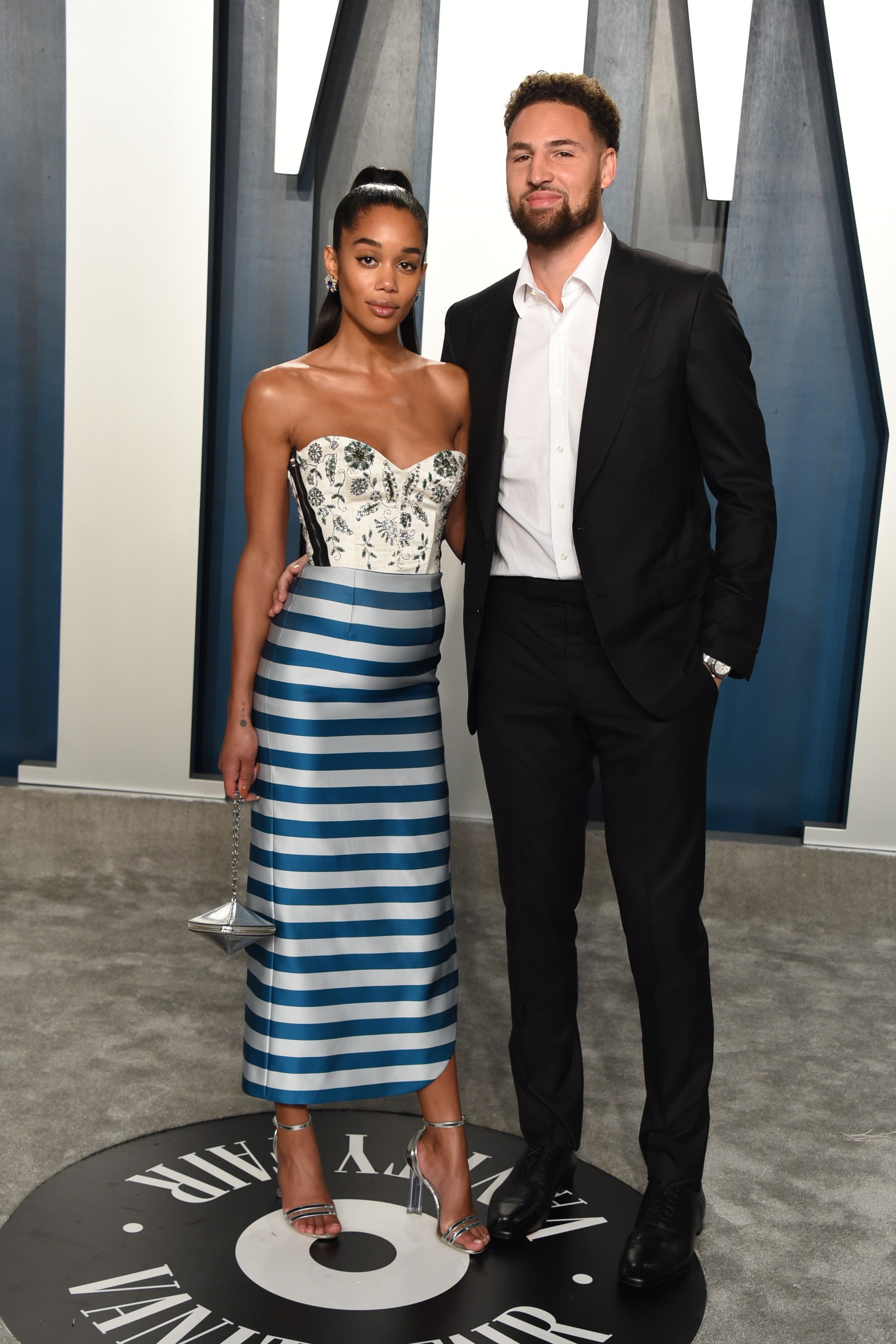  Laura Harrier and Klay Thompson arrive at the 2020 Vanity Fair Oscar Party at Wallis Annenberg Center for the Performing Arts in Beverly Hills, California on February 09, 2020 | Source: Getty Images