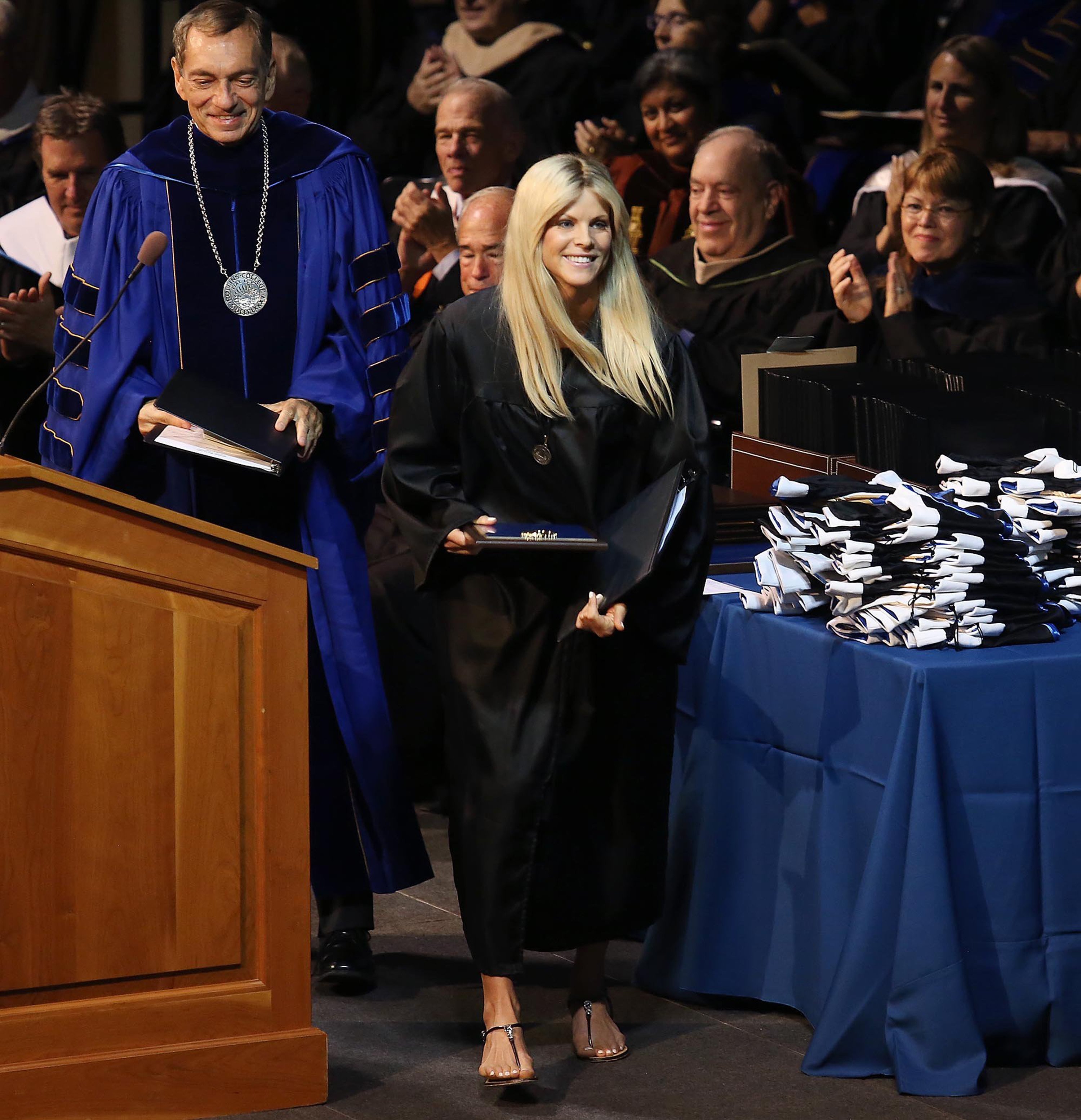 Elin Nordegren walks off the stage after speaking during commencement ceremonies at Rollins College in Winter Park, Florida on May 10, 2014 | Source: Getty Images