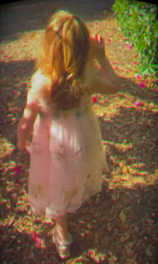 Lilibet walking outside in a pink dress. | Source: Instagram/meghan