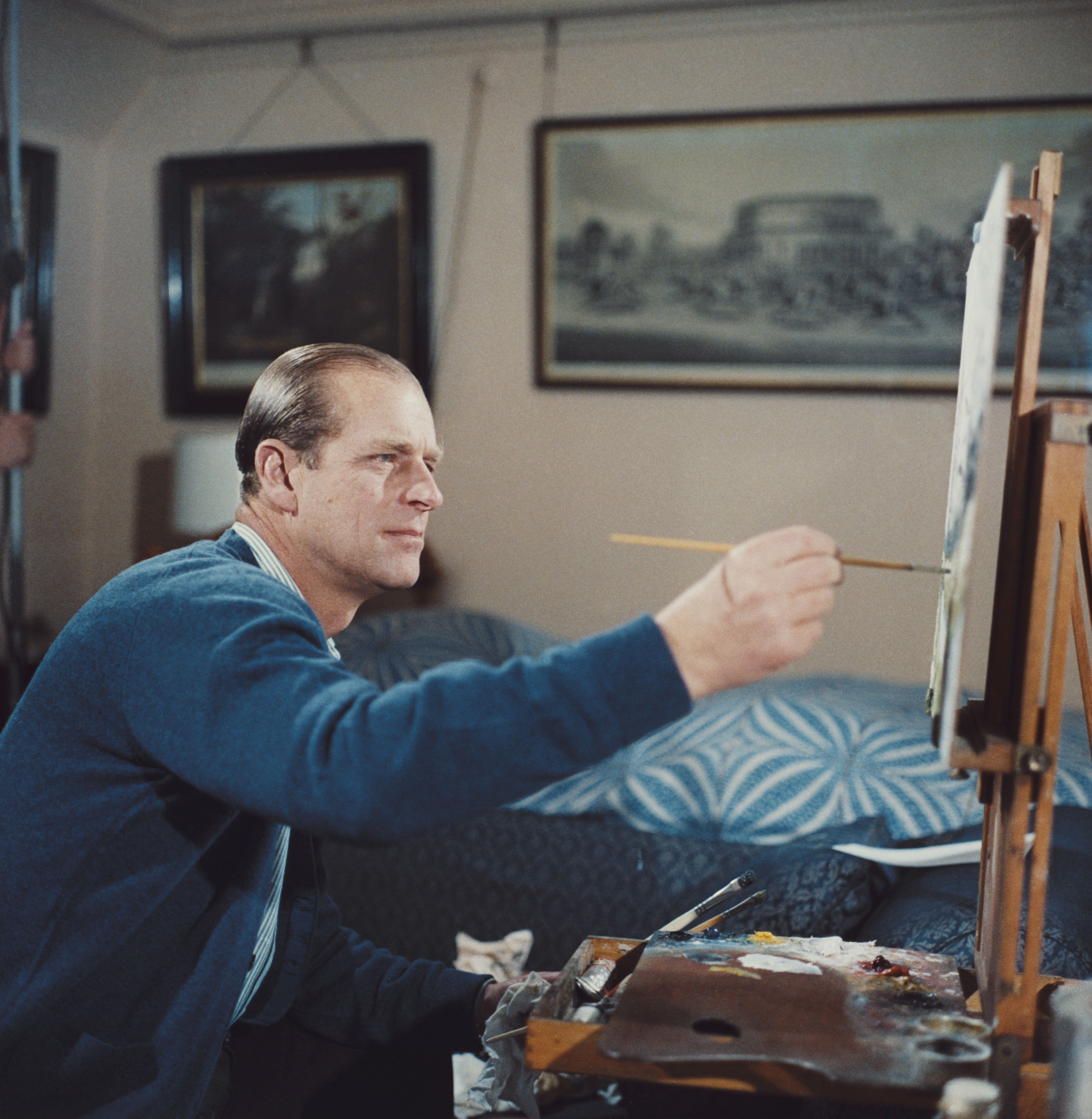 Prince Philip painting with oils during filming of the television documentary 'Royal Family' in London in 1969 | Source: Getty Images