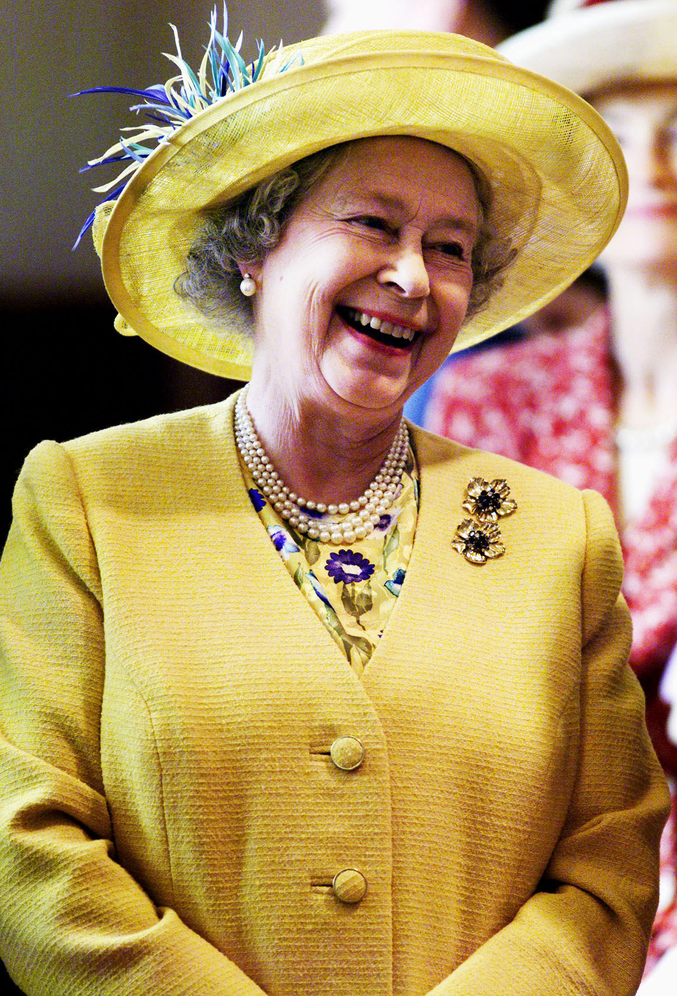 Queen Elizabeth II visiting the New Lanark Conservation Trust in New Lanark, Scotland in 2000. | Source: Getty Images