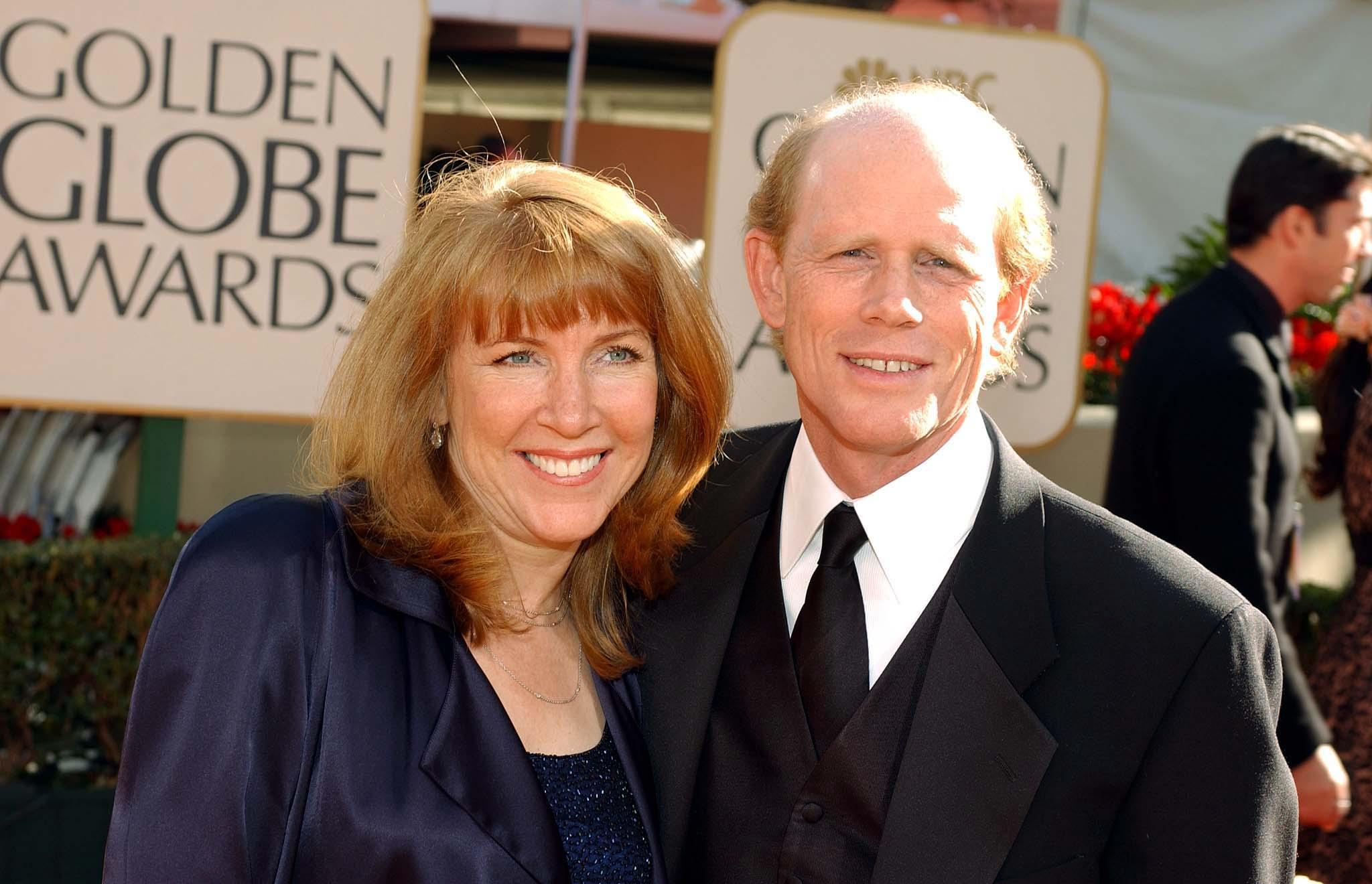 Director of the feature film, "A Beautiful Mind," Ron Howard (R) and his wife Sheryl at the 59th Annual Golden Globe Awards at the Beverly Hilton in Beverly Hills, California on January 20, 2002 | Source: Getty Images