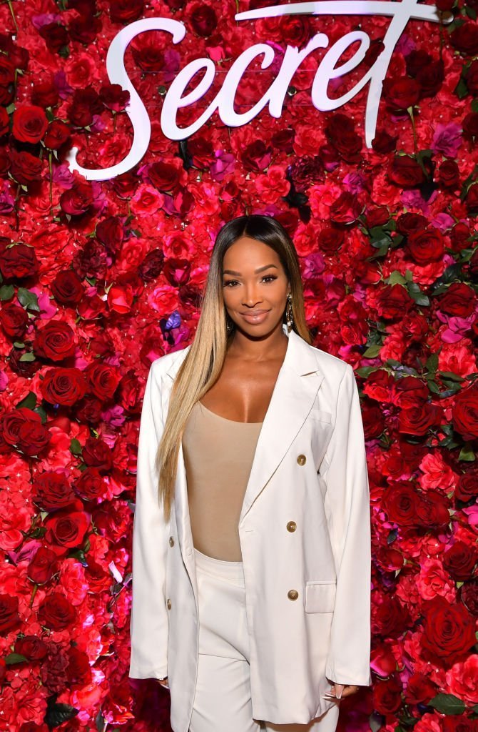 Malika Haqq poses during the launch party for Secret with Essential Oils on October 1, 2019. | Source: Getty Images