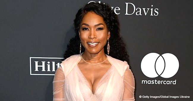 Angela Bassett, 60, leaves little to the imagination in cleavage-baring blouse at pre-Grammys party