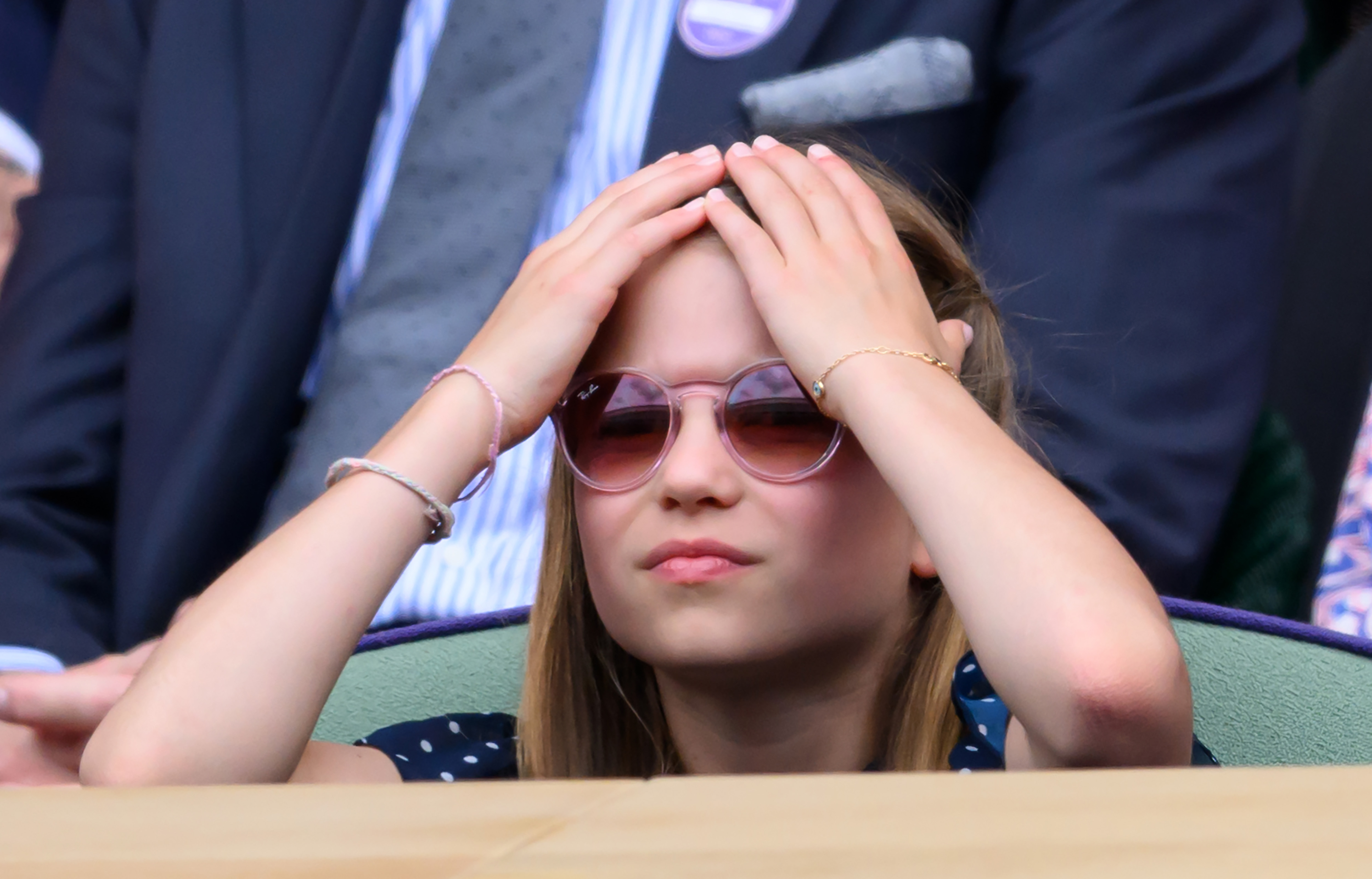 Princess Charlotte feeling the tension at the men's finals at Wimbledon in London on July 14, 2024 | Source: Getty Images