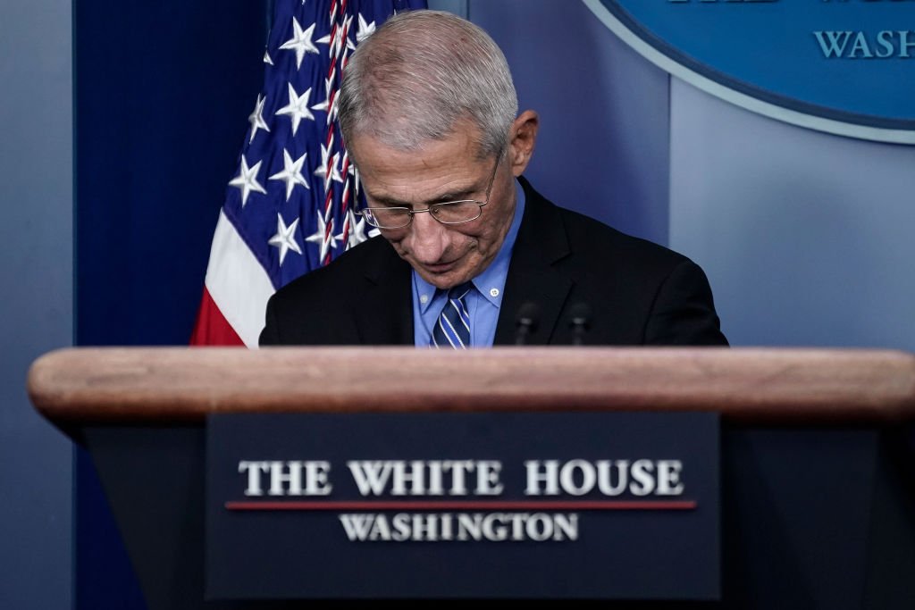 Dr. Anthony Fauci, director of the National Institute of Allergy and Infectious Diseases, waits for U.S. President Donald Trump to arrive for a briefing on the coronavirus pandemic, in the press briefing room of the White House on March 24, 2020 | Photo: Getty Images