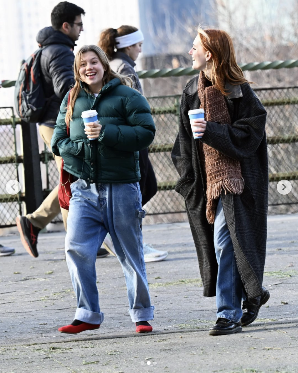 Matilda Ledger and her friend walk in Brooklyn with coffees in hand, posted on January 13, 2025 | Source: Instagram.com/pagesix