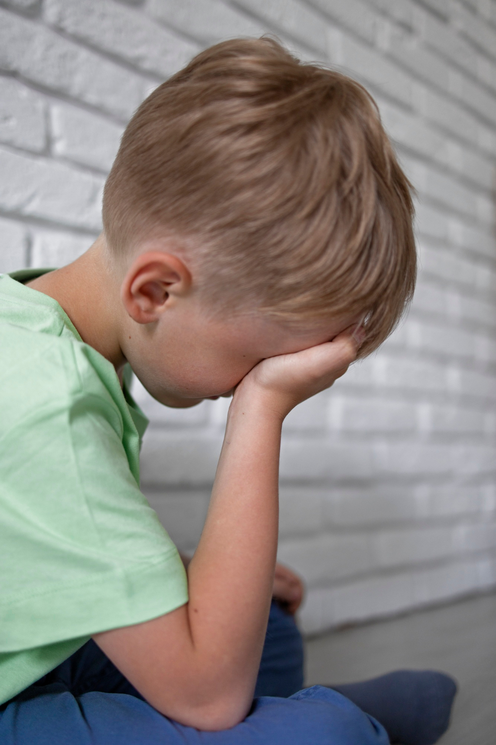 Close-up shot of a sad boy | Source: Freepik