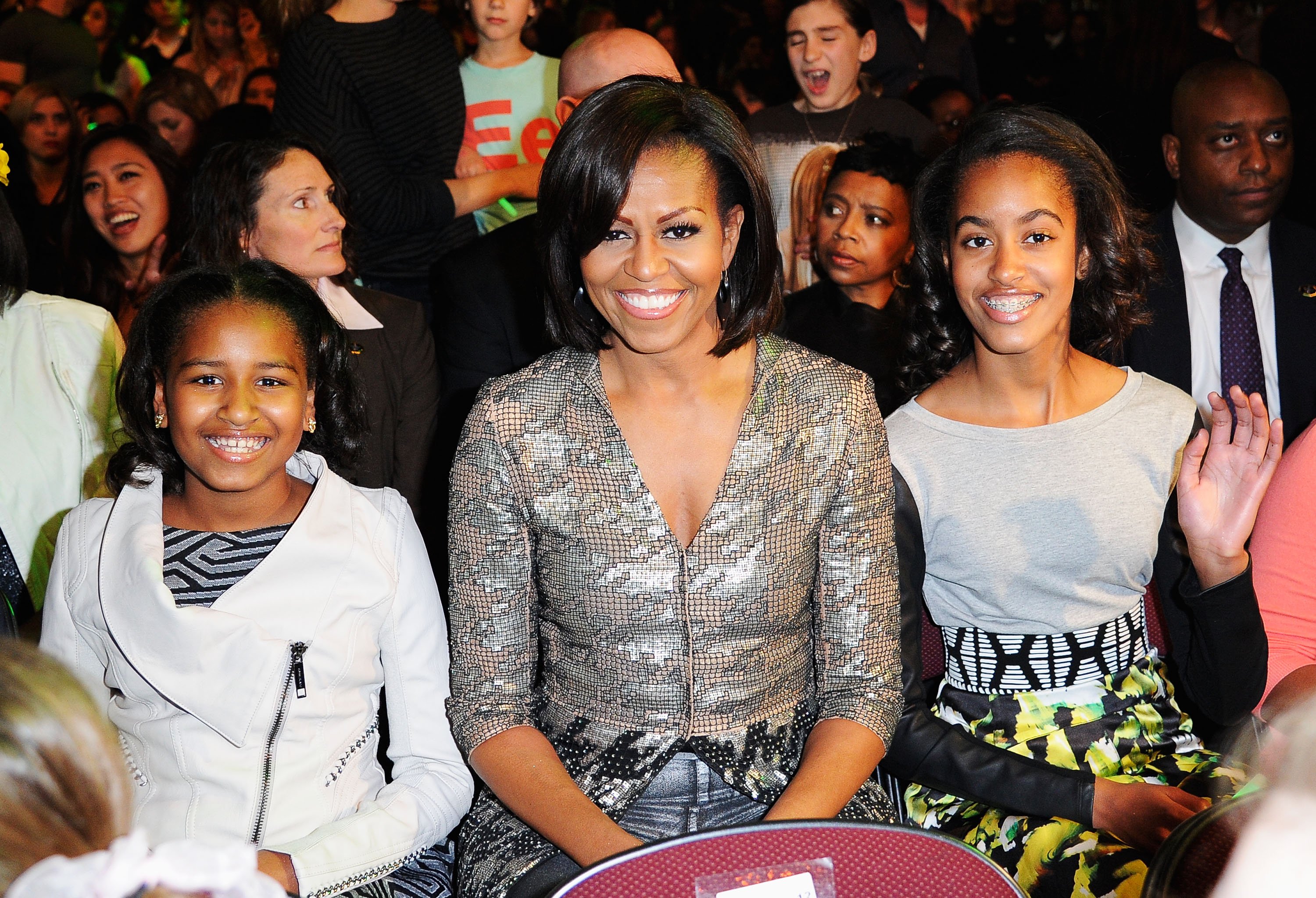  Michelle Obama with daughters Malia and Sasha at Galen Center on March 31 2012 in Los Angeles California | Source: Getty Images
