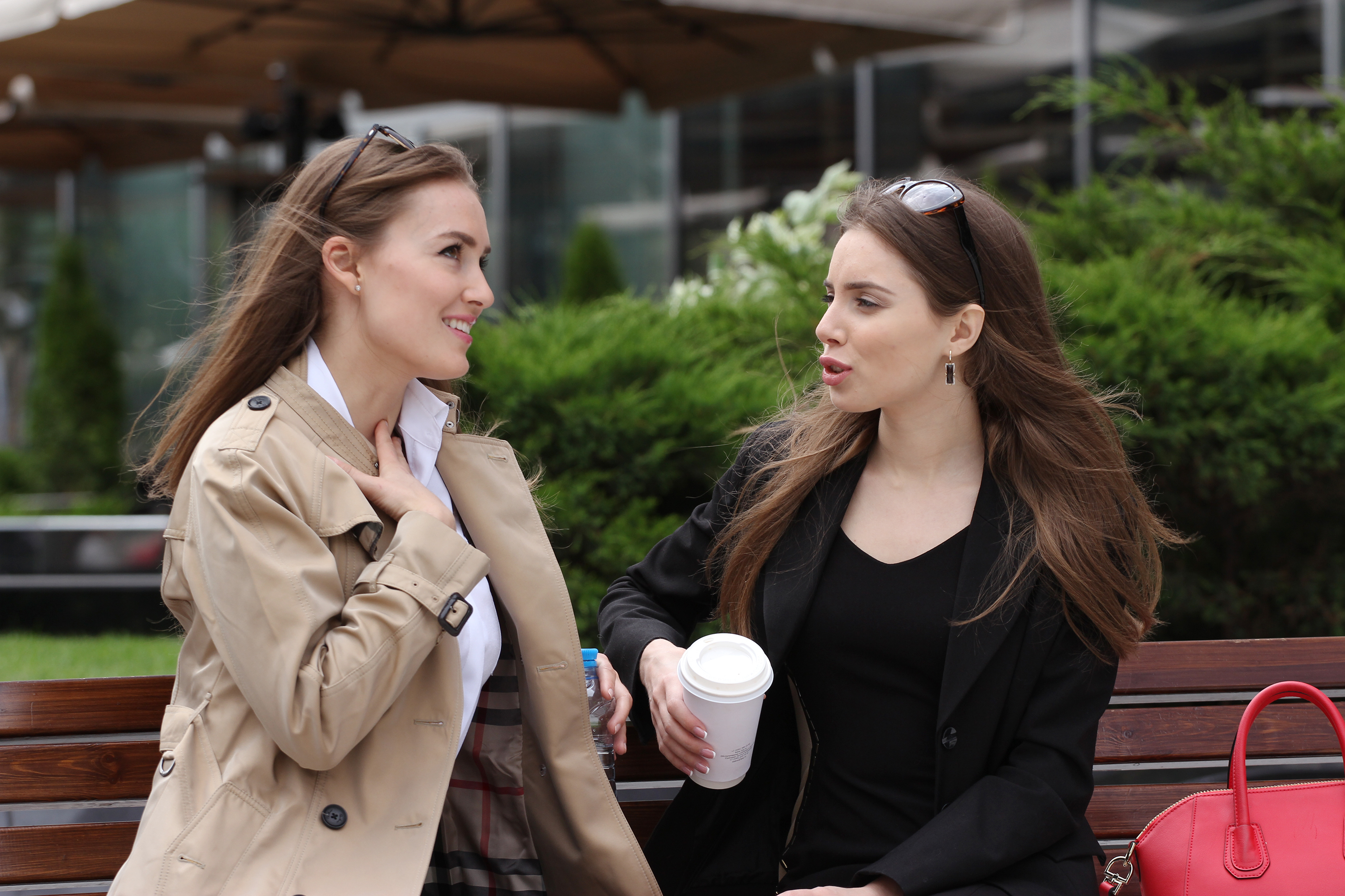 Two girls talking | Source: Shutterstock
