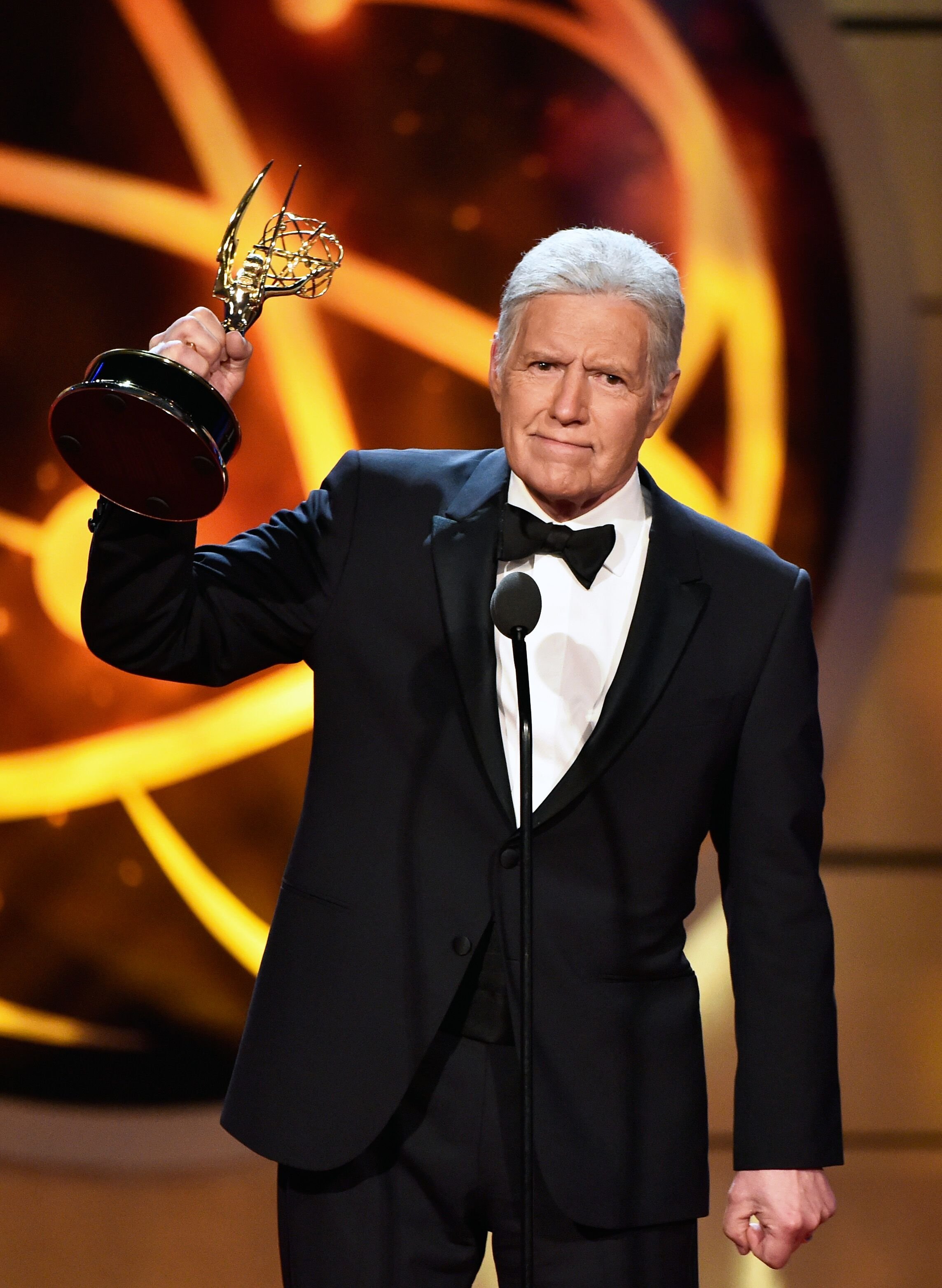 Alex Trebek accepts a Daytime Emmy Award for Outstanding Game Show Host. | Source: Getty Images