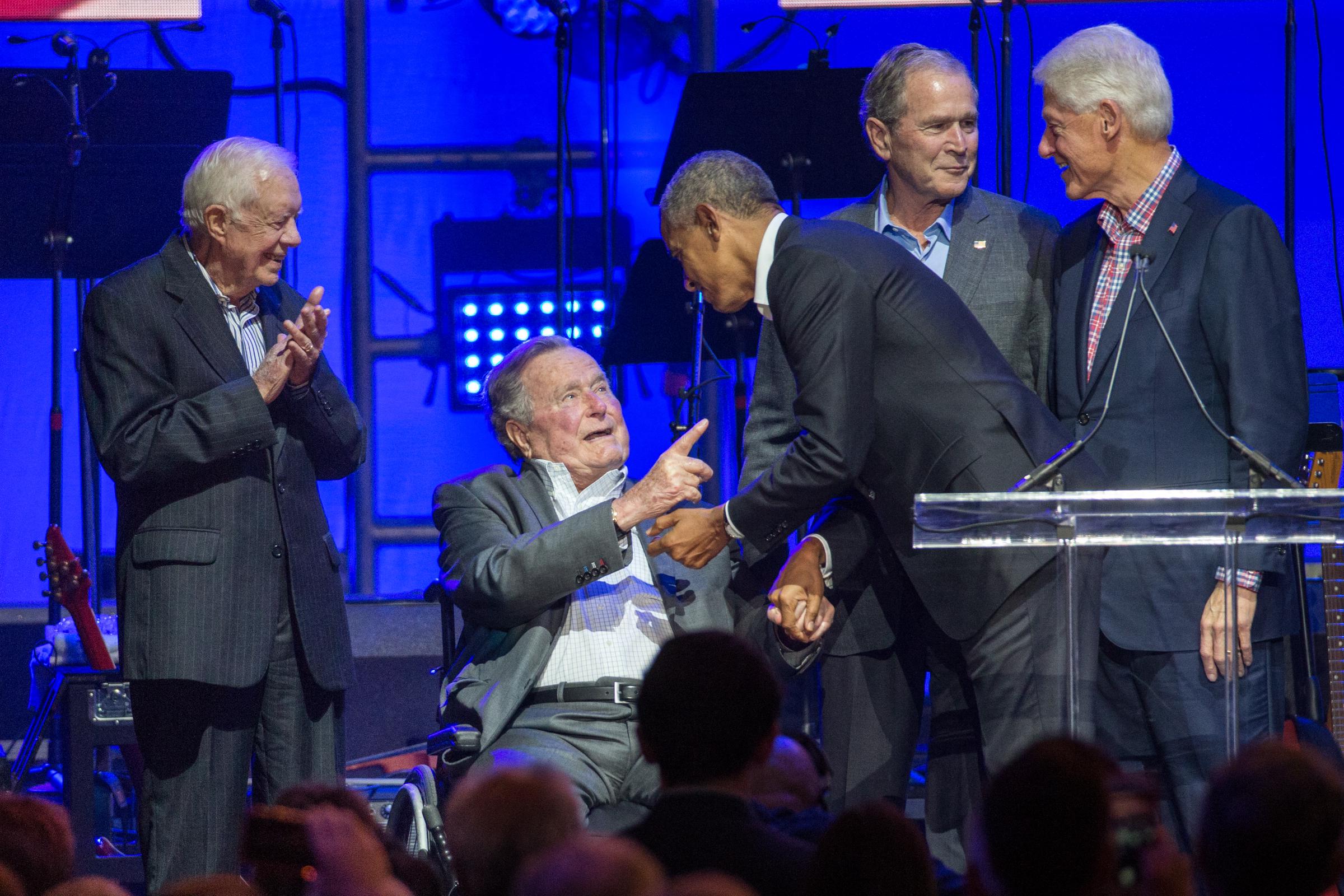 Jimmy Carter, George H. W. Bush, Barack Obama, George W. Bush and Bill Clinton attend the Hurricane Relief concert on October 21, 2017, in College Station, Texas.