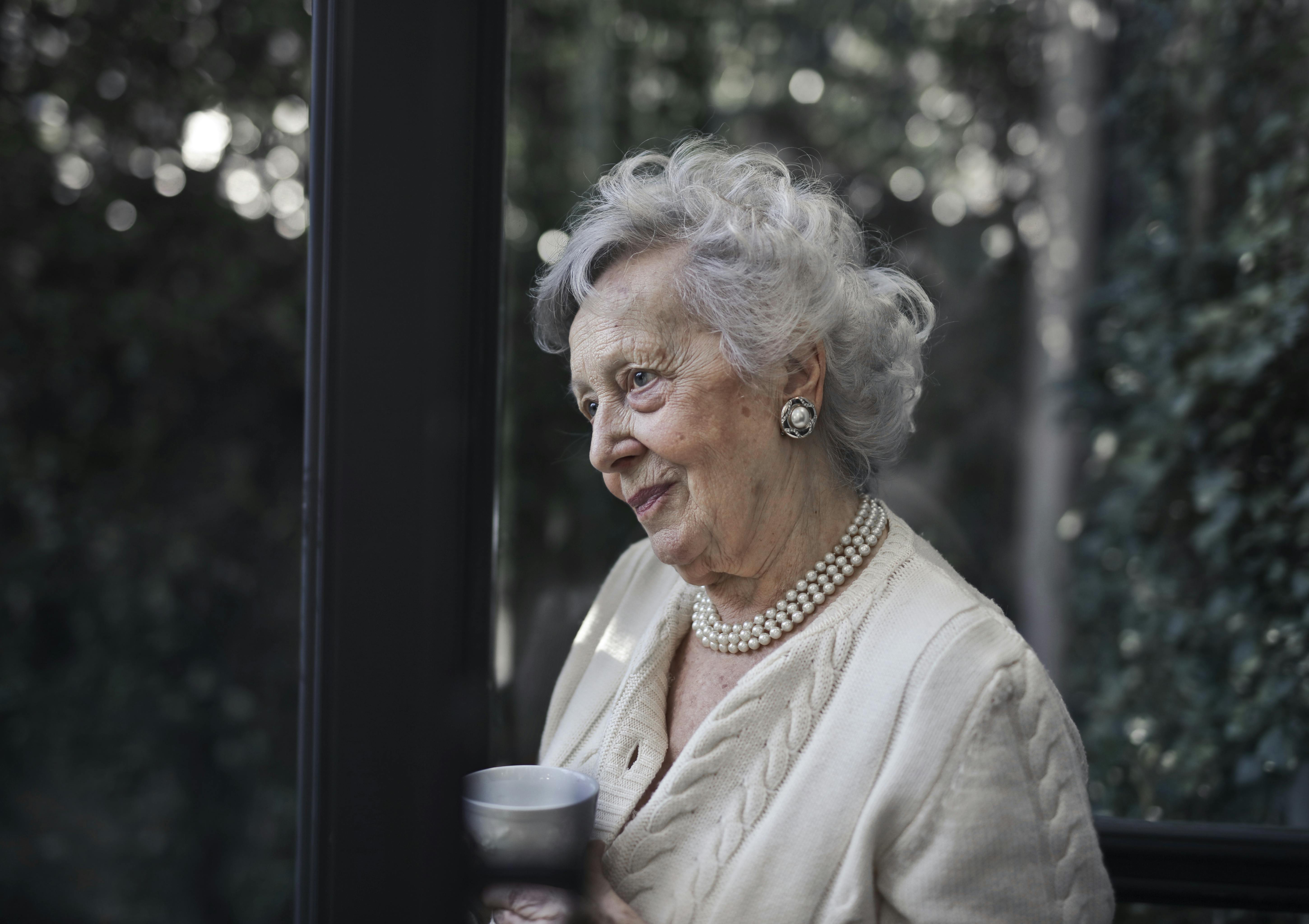 Elderly woman with a cup | Source: Pexels