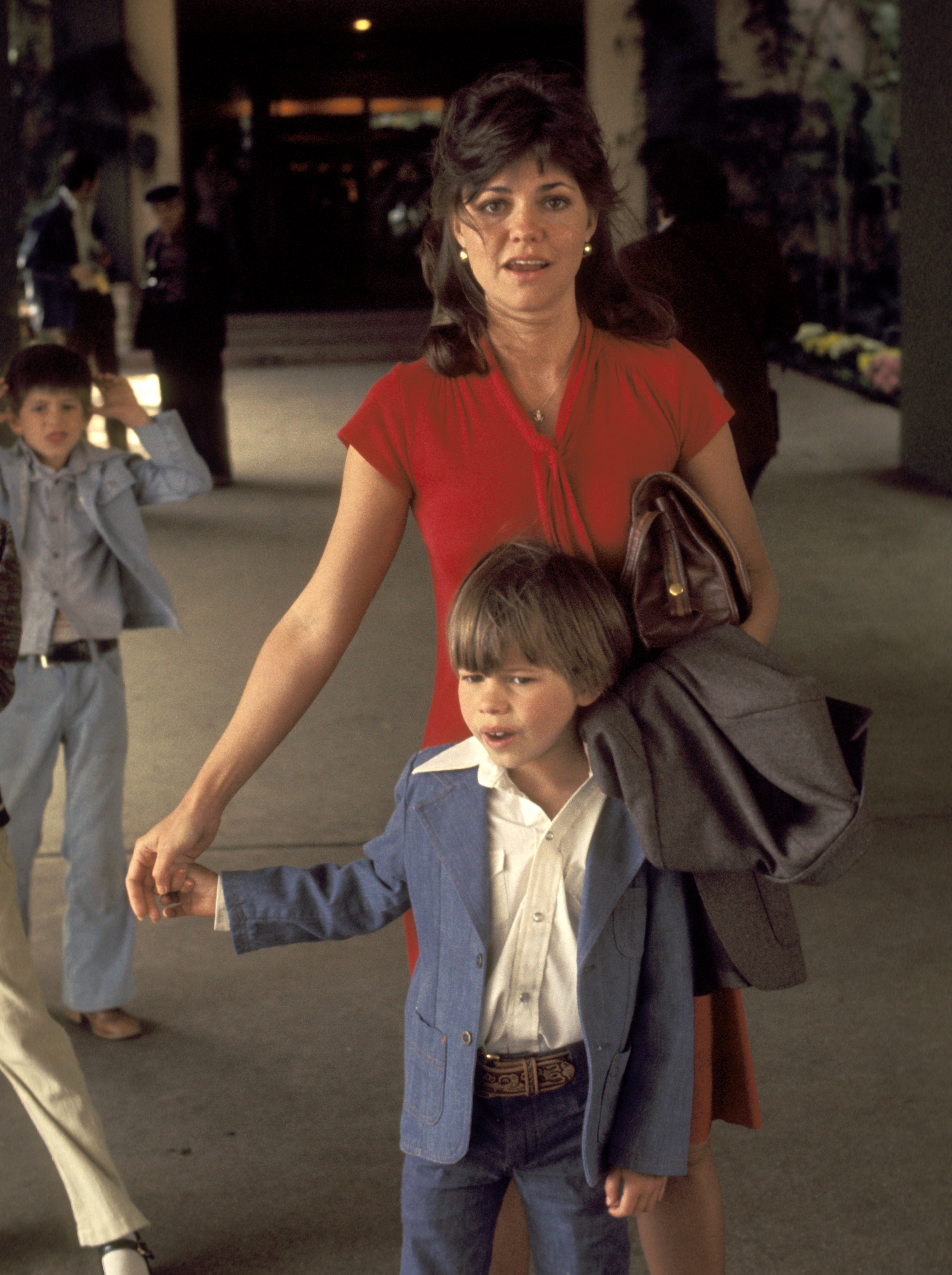 Sally Field and her son Peter Craig seen at Beverly Hills Hotel on April 17, 1977, in Beverly Hills, California | Source: Getty Images
